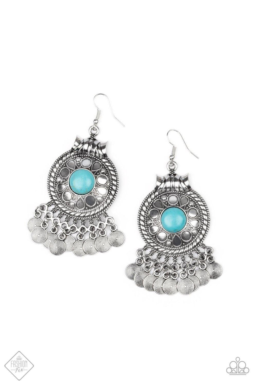 Paparazzi Accessories - Rural Rhythm - Blue Earrings a polished turquoise stone is pressed into the center of a silver frame stamped in seasonal floral patterns. Textured silver discs dangle from the bottom of the frame, creating a whimsical fringe. Earring attaches to a standard fishhook fitting.  Sold as one pair of earrings.