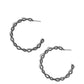 Paparazzi Accessories - Haute Helix - Black Hoop Earrings textured gunmetal bars delicately twist into a glistening helix, creating an edgy oversized hoop. Earring attaches to a standard post fitting. Hoop measures approximately 2" in diameter.  Sold as one pair of hoop earrings.