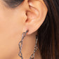 Paparazzi Accessories - Haute Helix - Black Hoop Earrings textured gunmetal bars delicately twist into a glistening helix, creating an edgy oversized hoop. Earring attaches to a standard post fitting. Hoop measures approximately 2" in diameter.  Sold as one pair of hoop earrings.