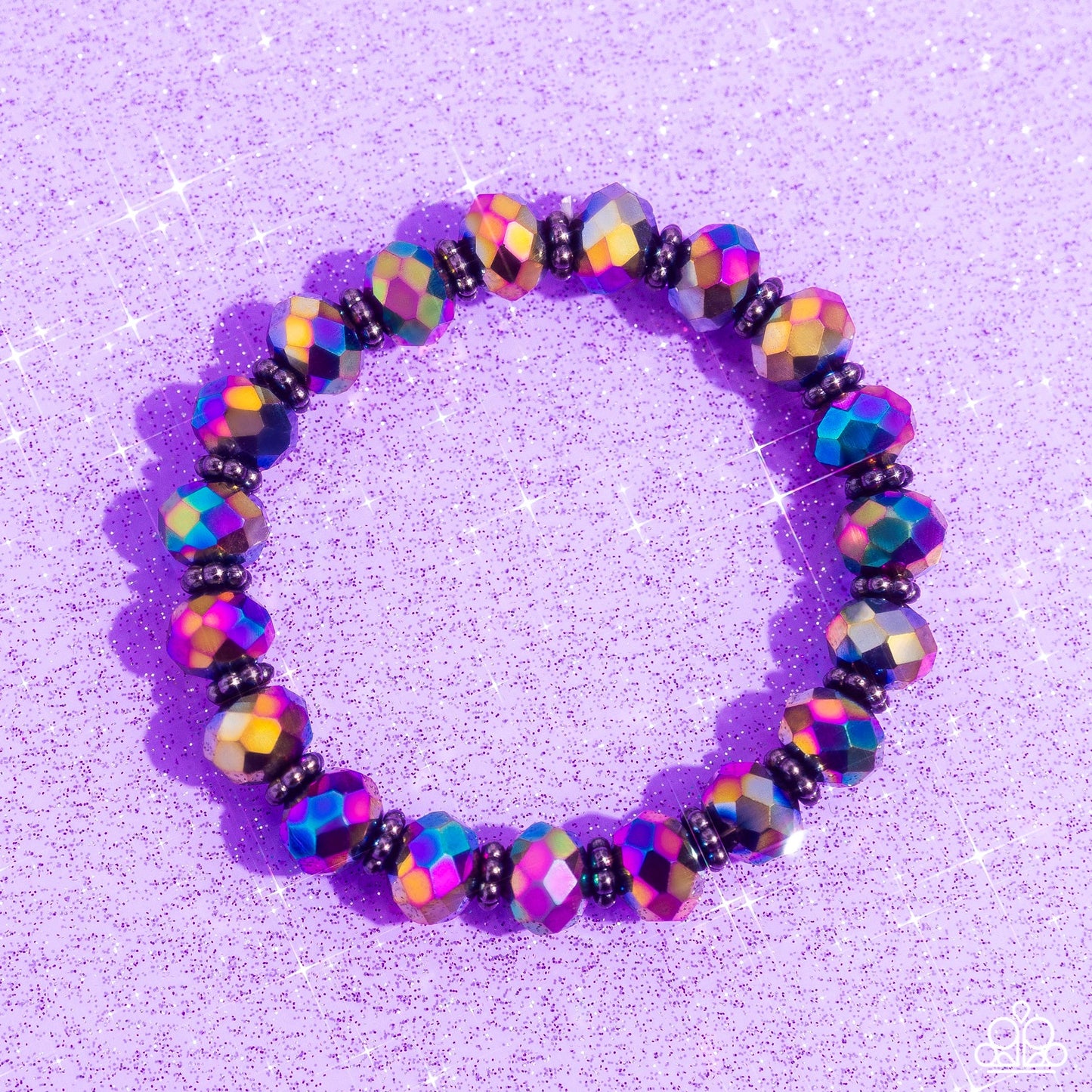 Paparazzi Accessories - Shimmering Satisfaction - Multi Bracelets fipped in metallic shimmer, glittery oil spill crystal-like beads and studded gunmetal rings are threaded along a stretchy band around the wrist for a stellar fashion. Sold as one individual bracelet.