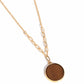 Paparazzi Accessories - WOODnt Dream of It - Gold Necklaces a circular piece of wood is nestled inside a simple gold fitting along a mismatched gold chain, creating an earthy pendant below the collar. Features an adjustable clasp closure.  Sold as one individual necklace. Includes one pair of matching earrings.