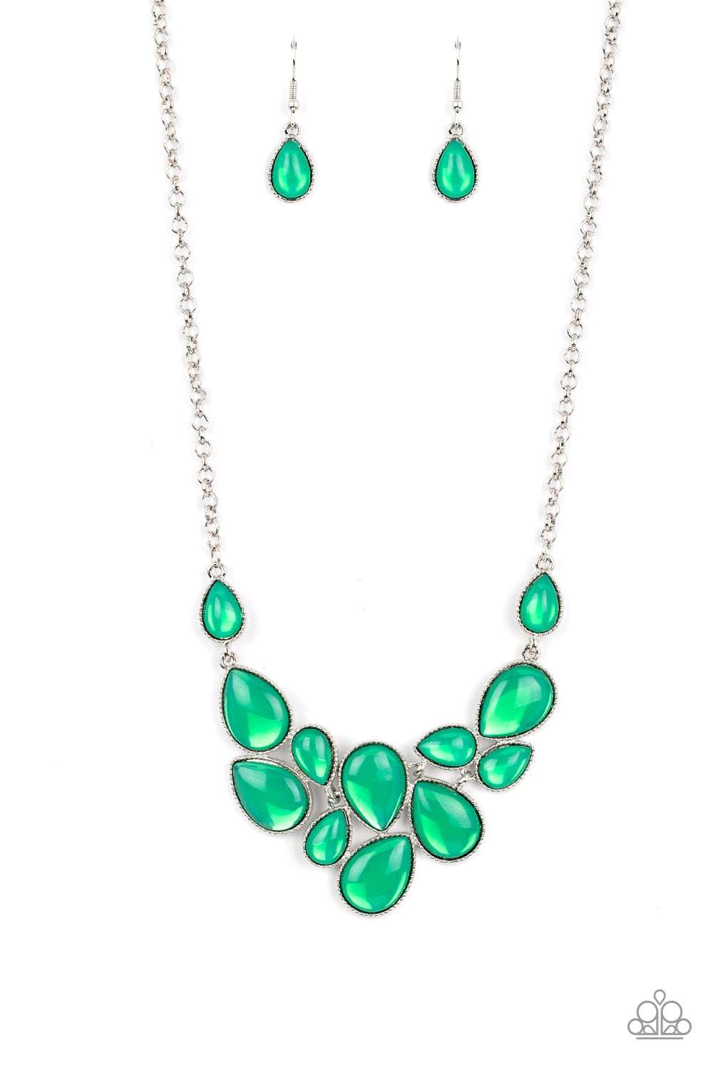 Paparazzi Accessories - Keeps GLOWING and GLOWING - Green Necklaces a cascade of glassy green teardrops are encased in studded silver frames, ultimately clustering below the collar to create an enchanting pop of color. Features an adjustable clasp closure. Sold as one individual necklace. Includes one pair of matching earrings.