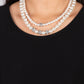Paparazzi Accessories - Brilliant Ballerina - White Pearl Necklaroutwo strands of classic white pearls in varying sizes coalesce around the collar in a refined fashion. Silver beads, encrusted in white rhinestones, introduce shimmery detail to each pearly layer, adding a playful spark of shimmer to the timeless design. Features an adjustable clasp closure.  Sold as one individual necklace. Includes one pair of matching earrings.