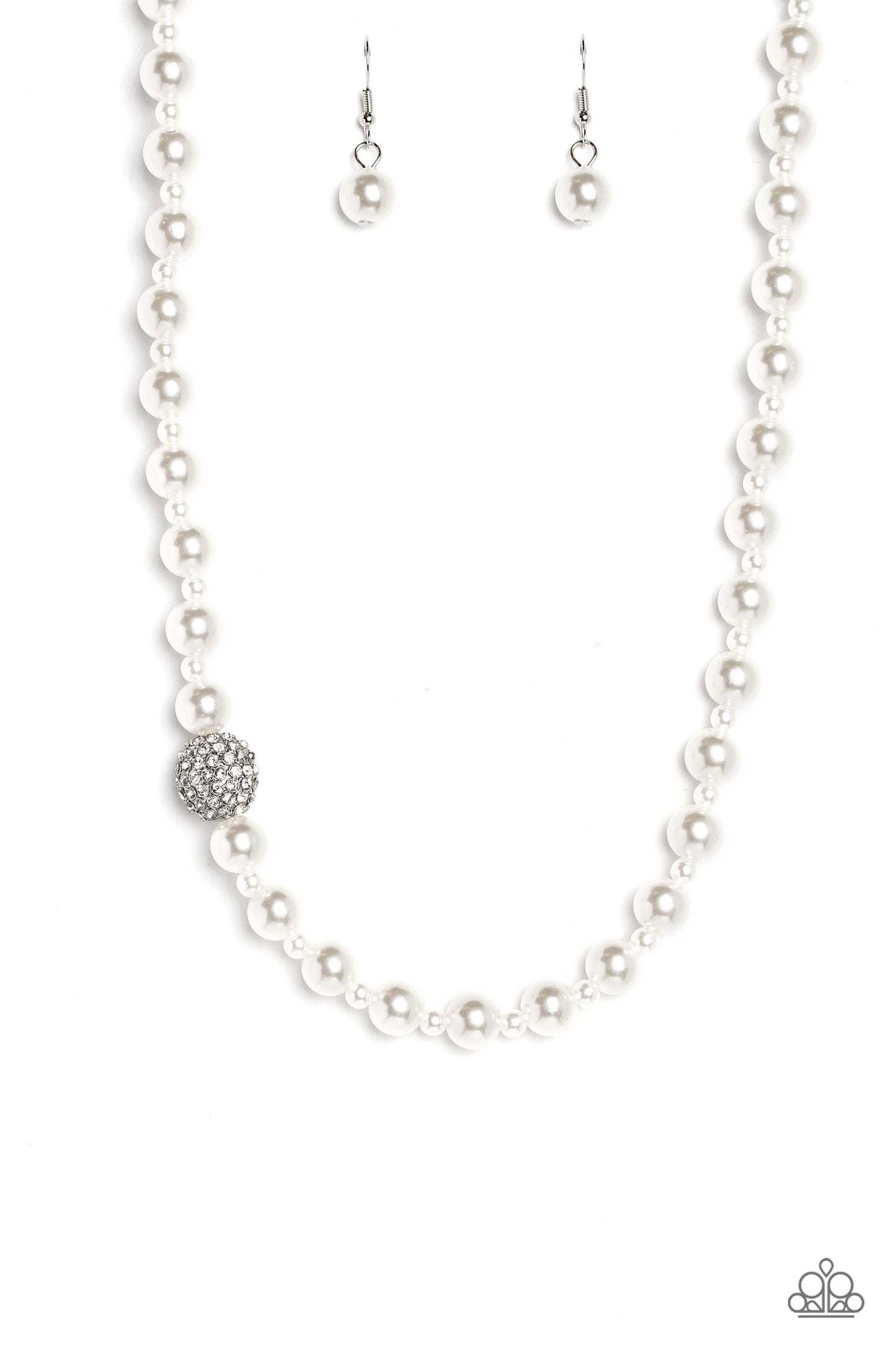 Paparazzi Accessories - Countess Chic - White Pearl Necklace strung along the entirety of an invisible wire, classic white pearls in varying sizes coalesce down the neckline for a refined finish. Adding to the elegant design, a sparkly white rhinestone-encrusted silver ornament shimmers amongst the sea of pearls. Features an adjustable clasp closure.  Sold as one individual necklace. Includes one pair of matching earrings.