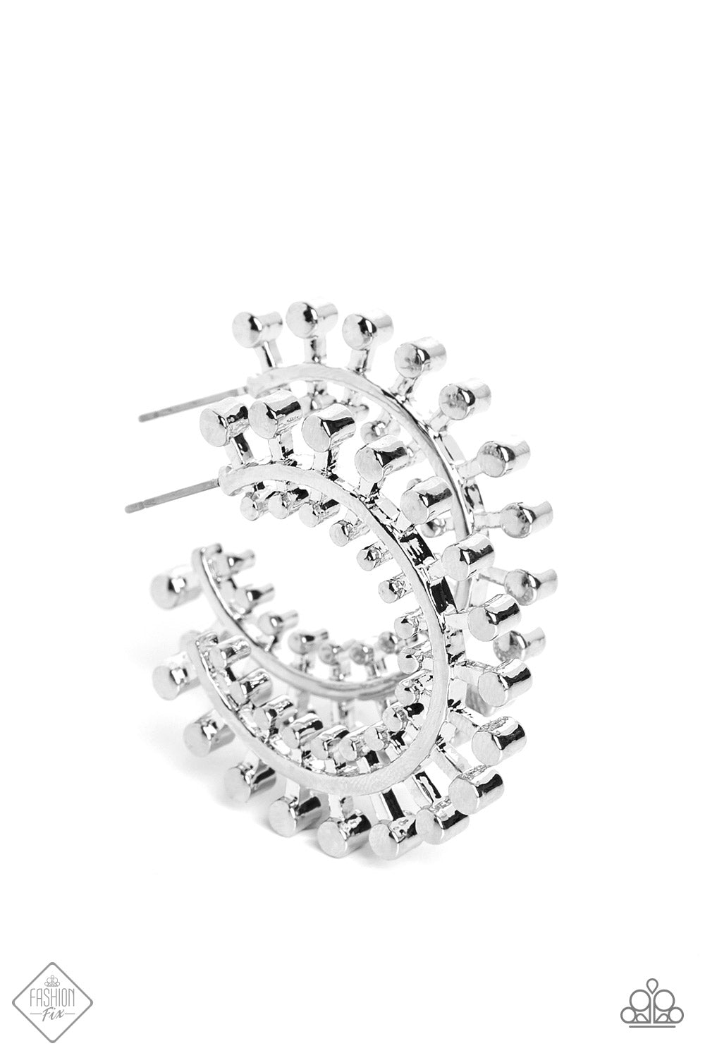 Tactile silver studs fan out along a classic silver hoop, erupting into a brilliant display of texture and sheen. Smaller studs line the inner edge of the hoop, adding additional eye-catching detail to the adventurous design. Earring attaches to a standard post fitting. Hoop measures approximately 1 1/4" in diameter.  Sold as one pair of hoop earrings.