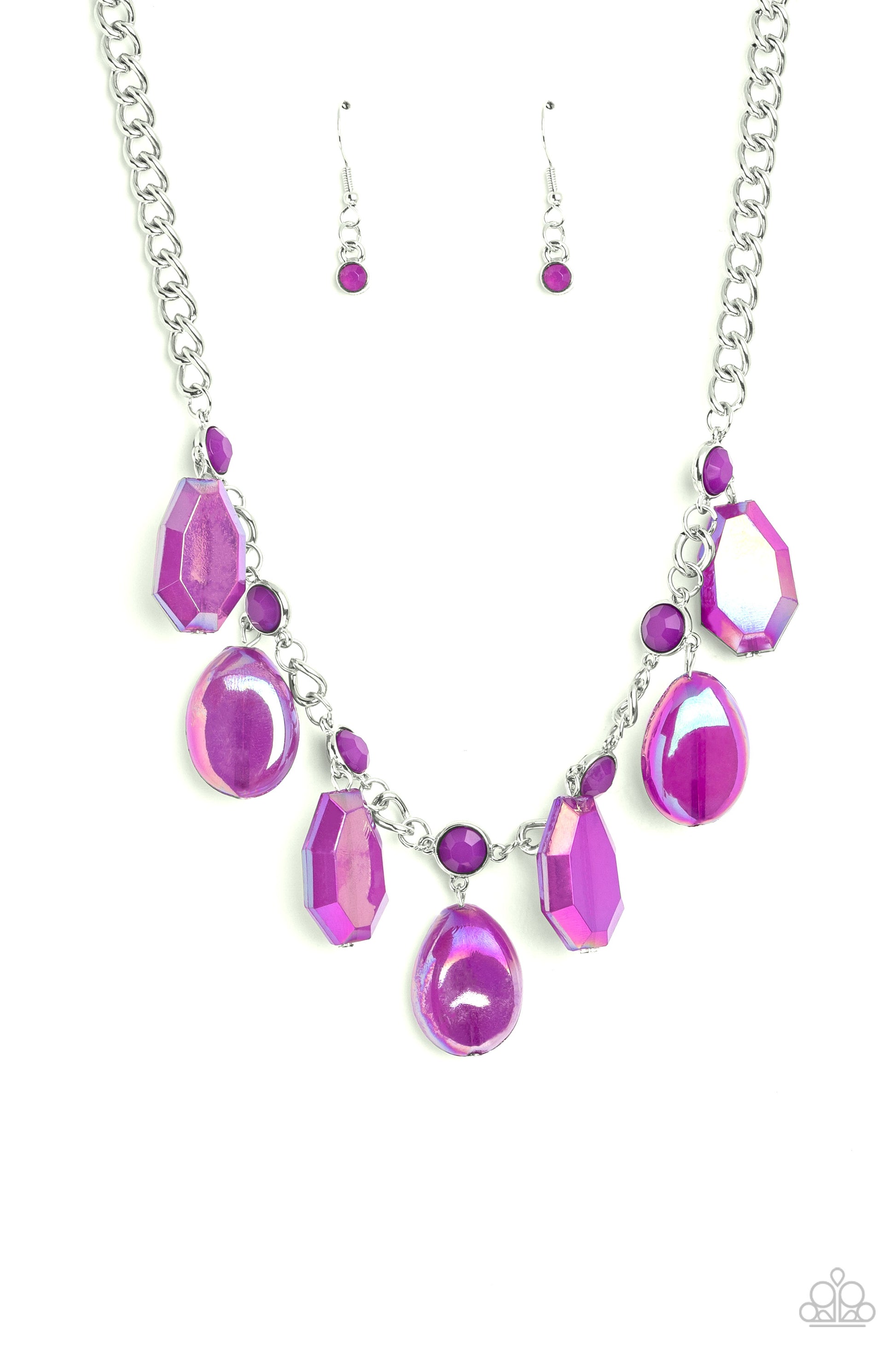 Paparazzi Accessories - Maldives Mural - Purple Necklaces an collection of chiseled, clear and milky geometric shapes in purple hues feature an oil spill overlay as they cascade from a silver curb chain, resulting in a bubbly and boisterous fringe below the collar. A layer of faceted milky purple beads are infused along the silver chain for an additional pop of color. Features an adjustable clasp closure.  Sold as one individual necklace. Includes one pair of matching earrings.