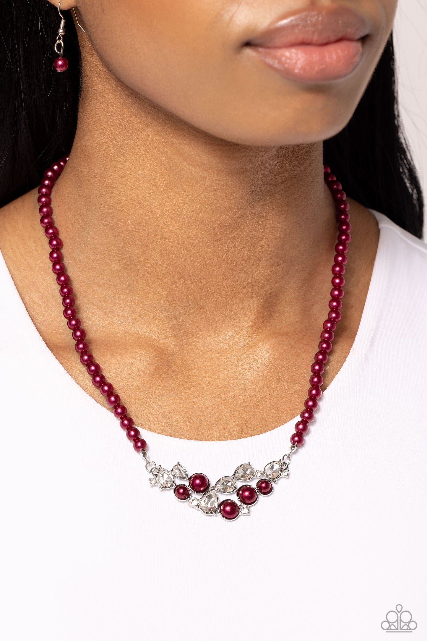Paparazzi Accessories - Pampered Pearls Red Necklaces a single strand of wine pearls elegantly cascades below the collar to meet a refined collection of wine pearls in varying sizes and white gems pressed in round and teardrop frames for a sparkly finish. Features an adjustable clasp closure.  Sold as one individual necklace. Includes one pair of matching earrings.