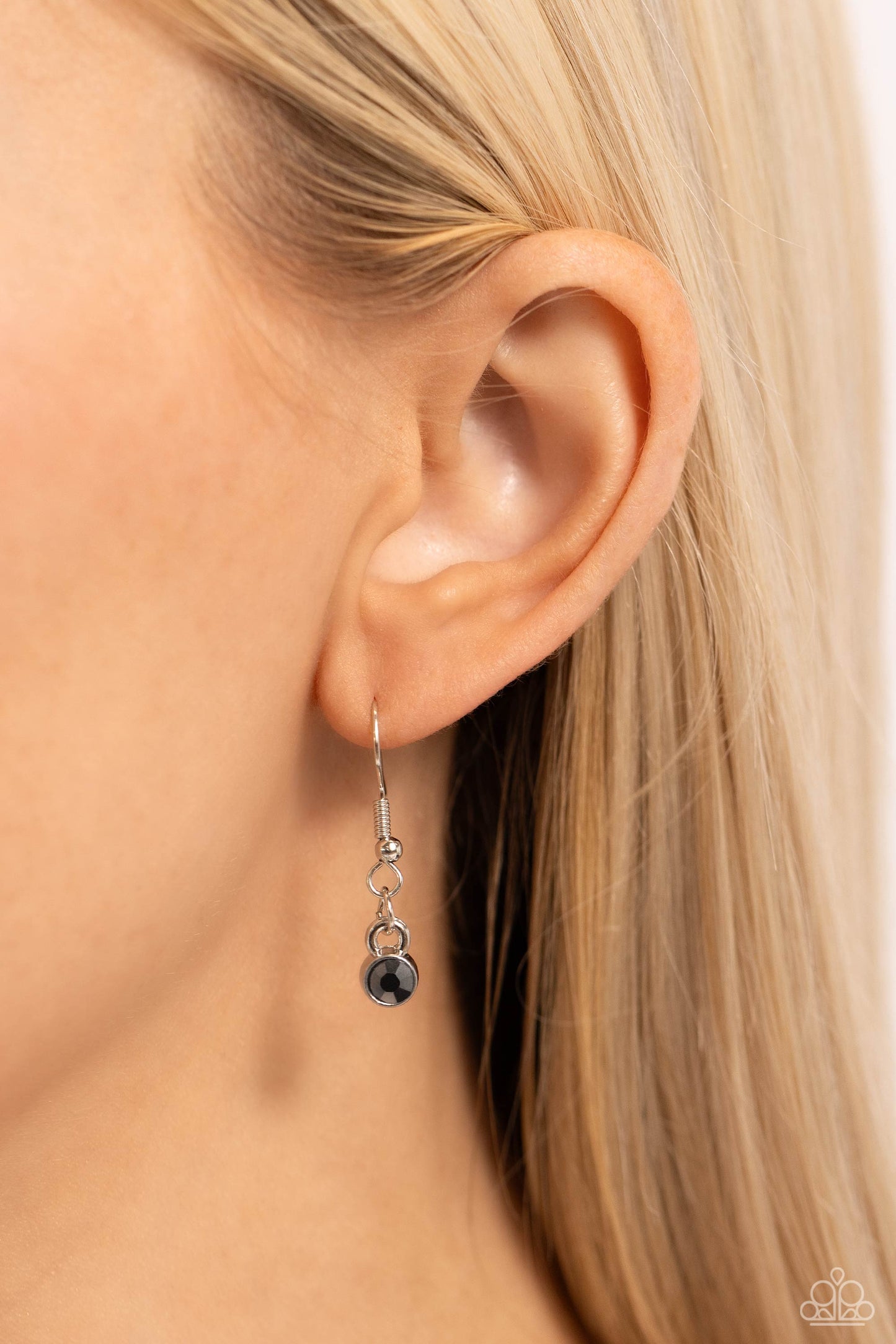 Paparazzi Accessories - EDGY or Not - Silver Necklaces embossed in an elongated dotted motif, a rustic collection of silver discs in varying sizes ruggedly links below the collar for an artisan inspired fashion. A faceted, oval, hematite gem sits at an angle on the biggest disc for a dauntless pop of color against the neckline. Features an adjustable clasp closure. Featured inside The Preview at Made for More! Sold as one individual necklace. Includes one pair of matching earrings.