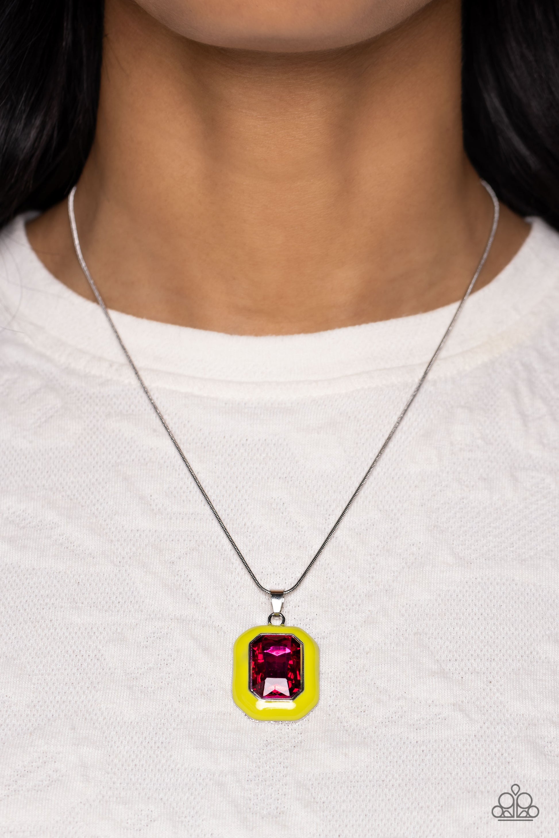 Paparazzi Accessories - Emerald Energy - Multi Necklace an oversized, fuchsia emerald-cut gem is bordered by a frame of neon Love Bird, creating a bright pendant that swings from the bottom of a silver snake chain. Features an adjustable clasp closure.  Sold as one individual necklace. Includes one pair of matching earrings.