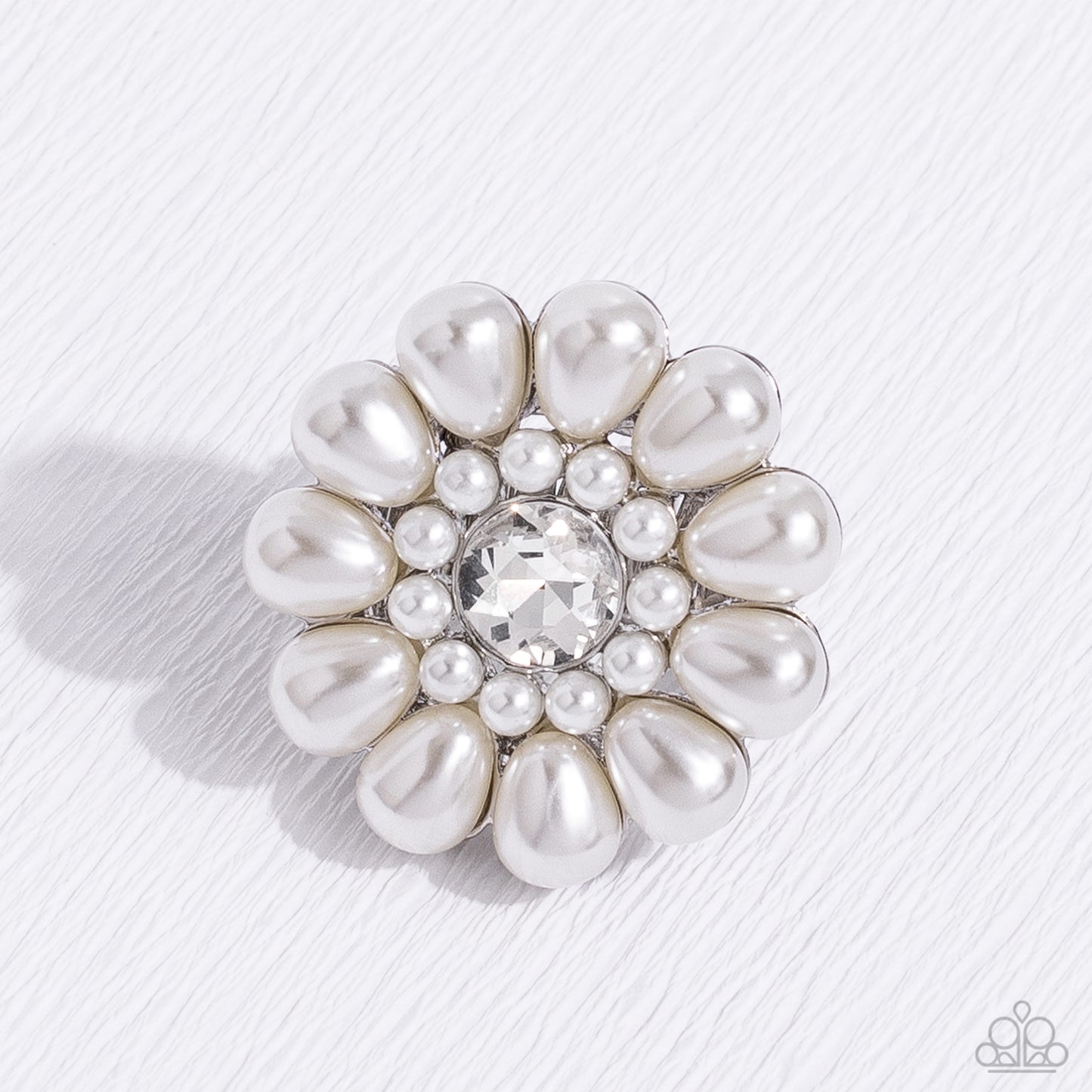 Paparazzi Accessories - Pearl Talk - September 2023 Life of the Party - White Pearl Ring featuring a glassy white gem center, bubbly oversized pearl petals fan out from dainty pearl settings atop the finger on airy silver bands for a sophisticated floral fashion. Features a stretchy band for a flexible fit. Sold as one individual ring.
