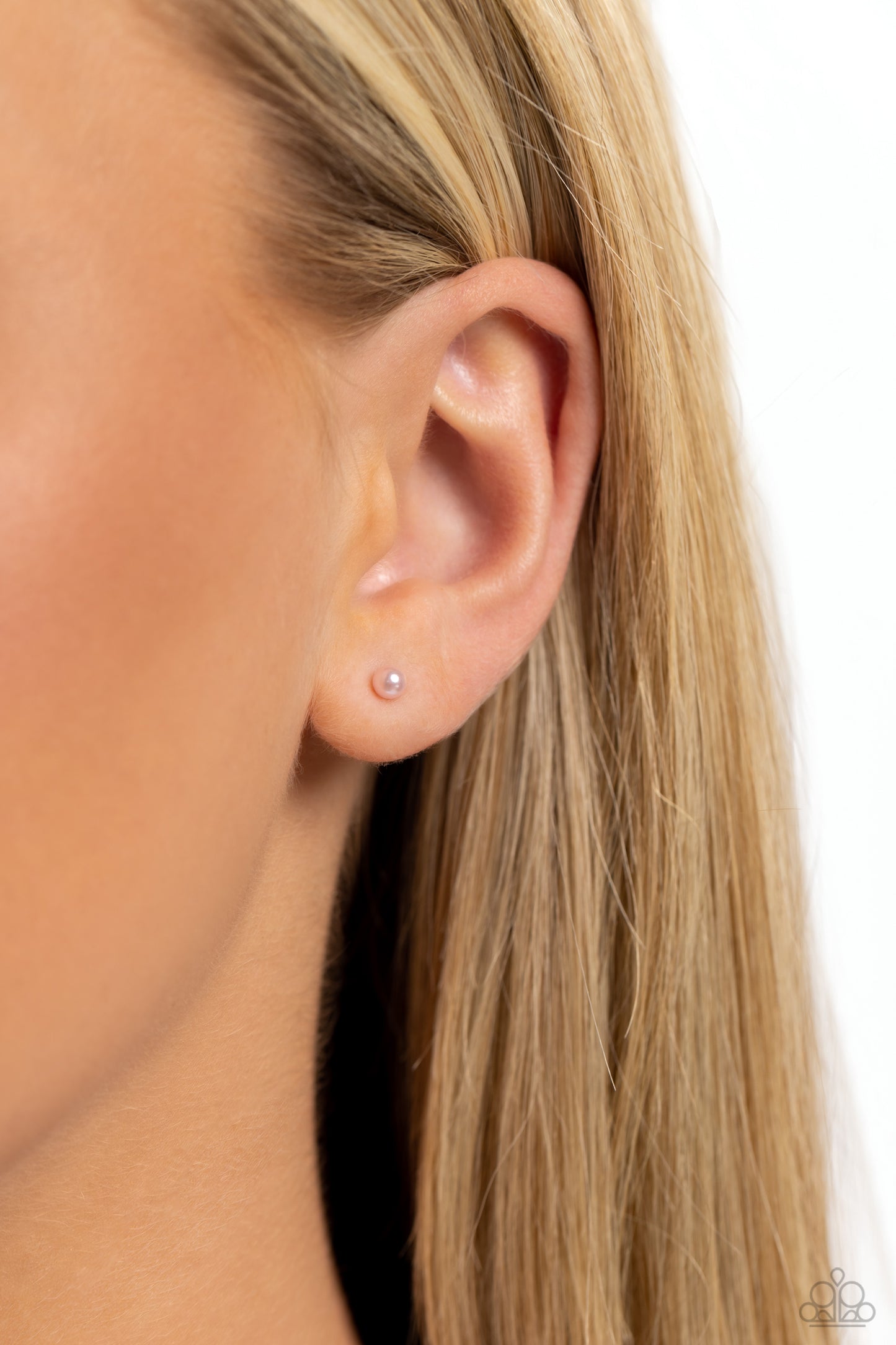 Paparazzi Accessories - Dainty Details - Pink Pearl Stud Earrings a dainty baby pink pearl rests against the ear for a timeless basic staple piece perfect for a vintage look. Earring attaches to a standard post fitting. Sold as one pair of post earrings.