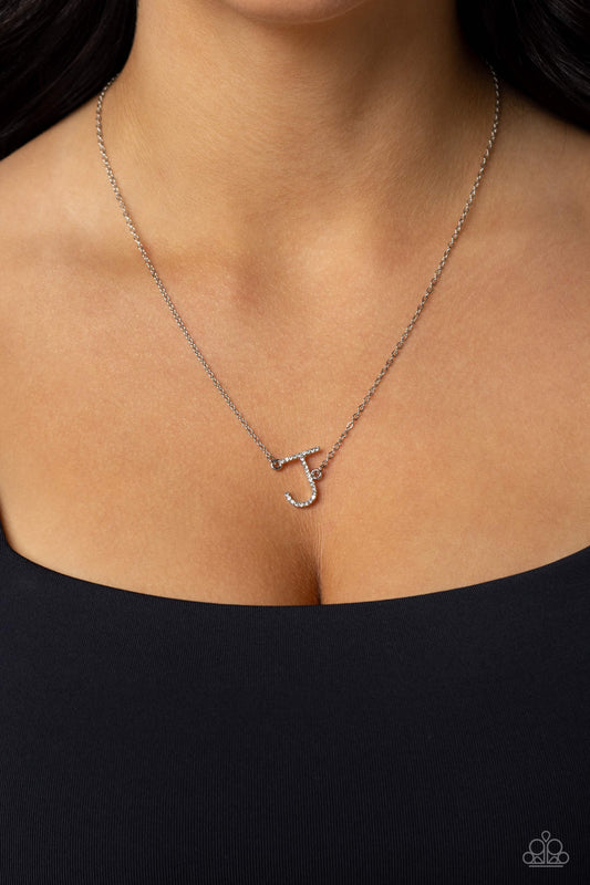 Paparazzi Accessories - Initially Yours - "J" White Necklaces embossed with dainty white rhinestones, a silver letter "J" hovers below the collar from a dainty silver chain, for a sentimentally simple design. Features an adjustable clasp closure.  Sold as one individual necklace. Includes one pair of matching earrings.