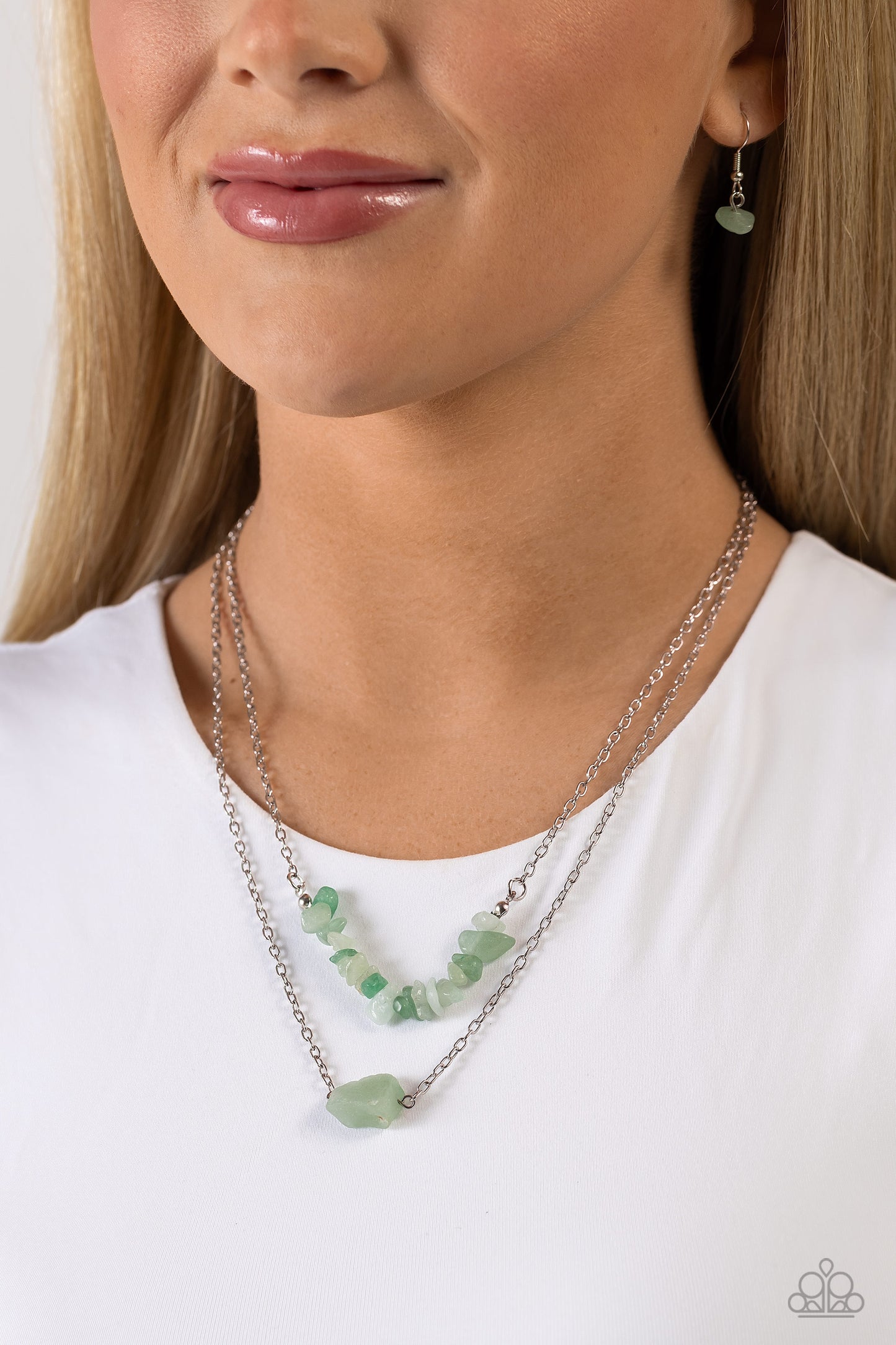 Paparazzi Accessories - Chiseled Caliber - Green Necklaces chiseled into a natural collection, a layer of jade stones gives way to a large, solitaire jade stone pendant, creating earthy layers down the chest. Features an adjustable clasp closure. As the stone elements in this piece are natural, some color variation is normal. Featured inside The Preview at Made for More! Sold as one individual necklace. Includes one pair of matching earrings.