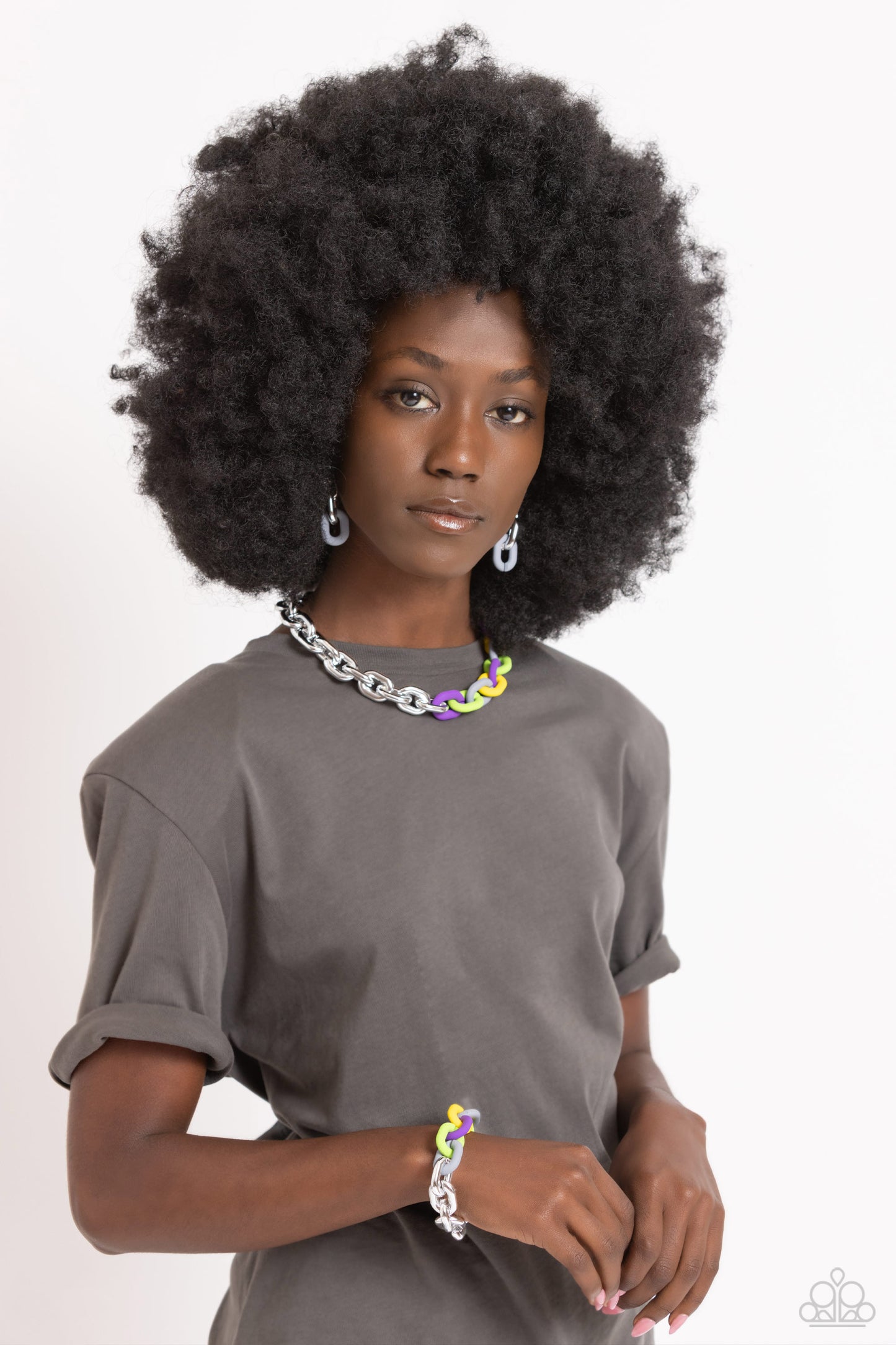 Paparazzi Accessories - Contrasting Couture & Candid Contrast - Silver Jewelry Set a strand of oversized silver curb chain collides with purple, High Visibility, Kohlrabi, and Ultimate Gray acrylic curb links to create an abstract blend of grit and color. The oversized links of the colored curb chain offset the high sheen of the silver that lays on the opposite side, perfectly balancing the contrasting design. Features an adjustable clasp closure. Sold as one individual choker necklace.