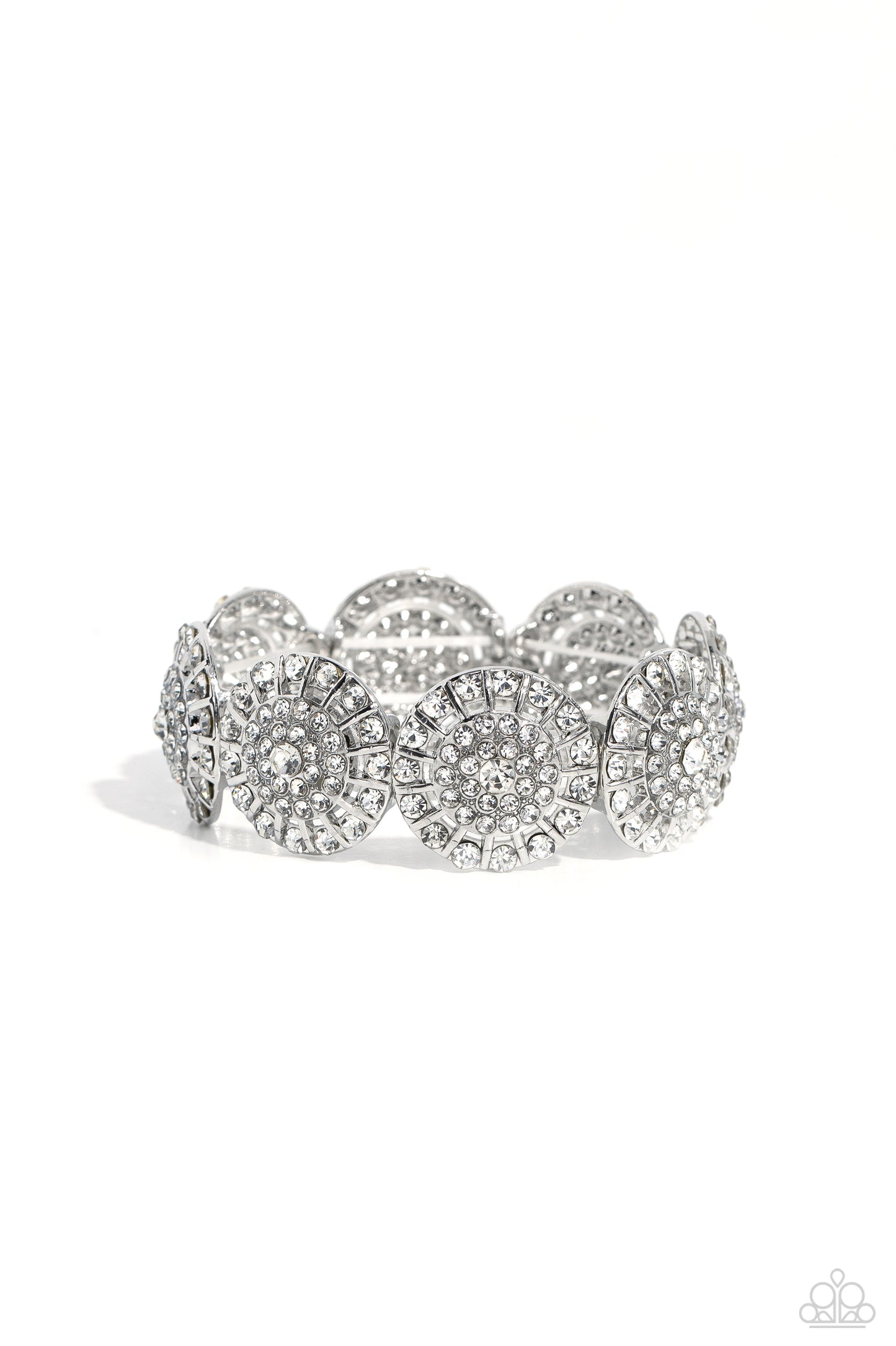 Paparazzi Accessories - Executive Elegance - White Bracelets featuring a wheel motif, concaved silver discs embossed in an explosion of white rhinestones slide along a stretchy band around the wrist for a hint of dazzling refinement. Sold as one individual bracelet.