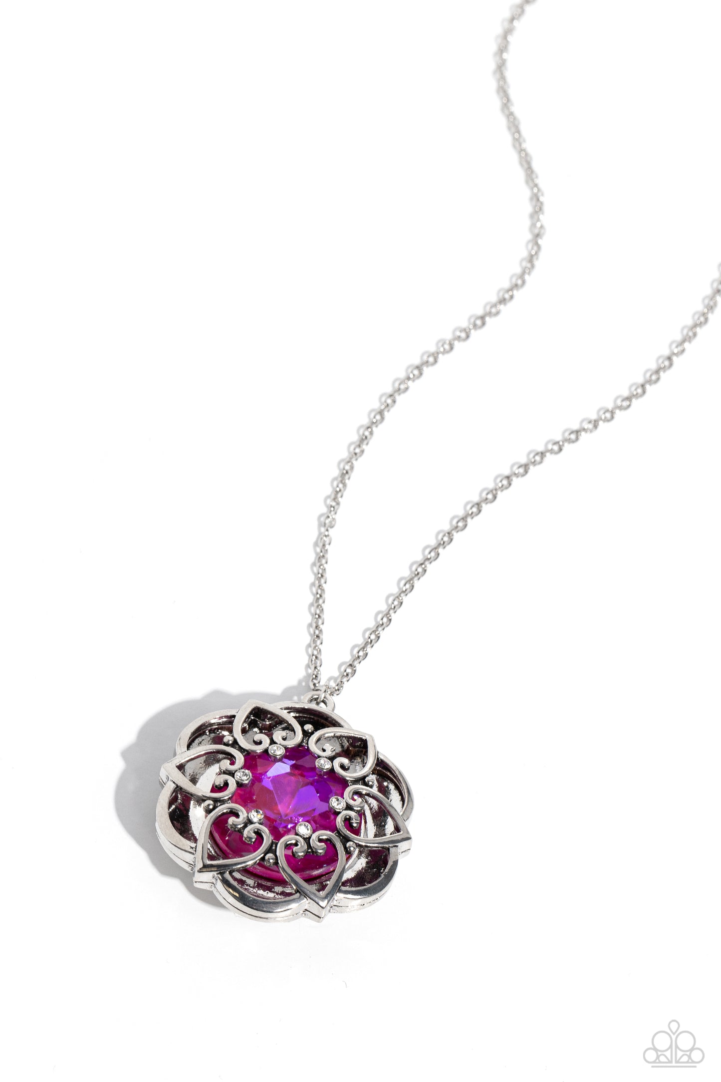 Paparazzi Accessories - Flowering Fantasy - Pink Necklaces pressed in the center of an oversized, thick silver floral frame, a pink UV gem glimmers from the chest. Intricate silver hearts, sprinkled with dainty white rhinestones, encircles the inner circle of the floral frame to create ornate, 3D petals. The whimsical pendant swings from the bottom of a lengthened, dainty silver chain for a seasonal look. Features an adjustable clasp closure. Sold as one individual necklace
