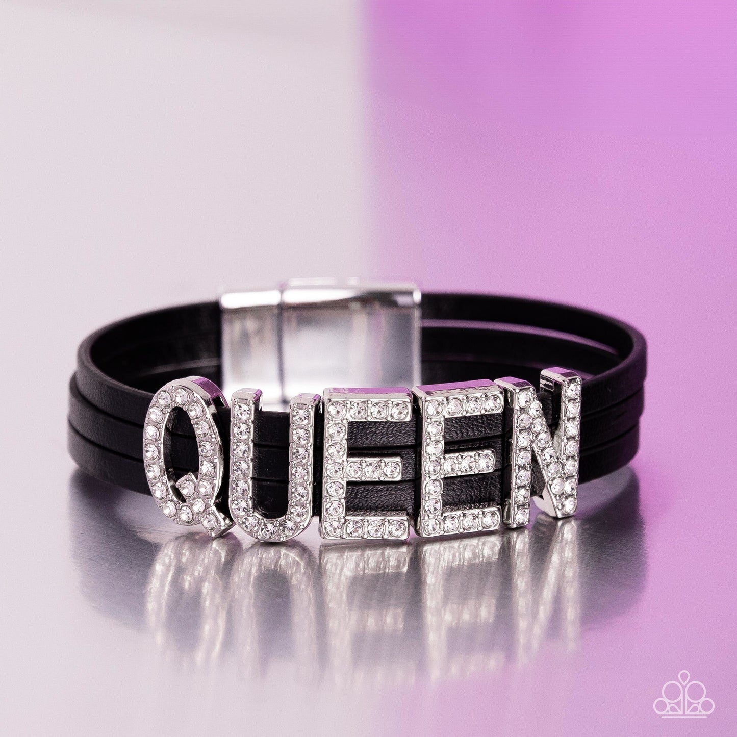 Paparazzi Accessories - Queen of My Life - Black Bracelframfeaturing glistening white rhinestones, silver letter frames forming the word "QUEEN" are threaded along layers of black leather strands around the wrist for a dazzling statement. Features a magnetic closure. Sold as one individual bracelet.
