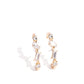 Paparazzi Accessories - Sliding Shimmer - Gold Earrings a glassy collection of white round, marquise-cut, and emerald-cut rhinestones and gems are pronged in place along a curved gold bar. Features a sleek surface for sliding ability to desired position on the ear. Due to its structure, adjusting capability is limited.  Sold as one pair of illusion post earrings.
