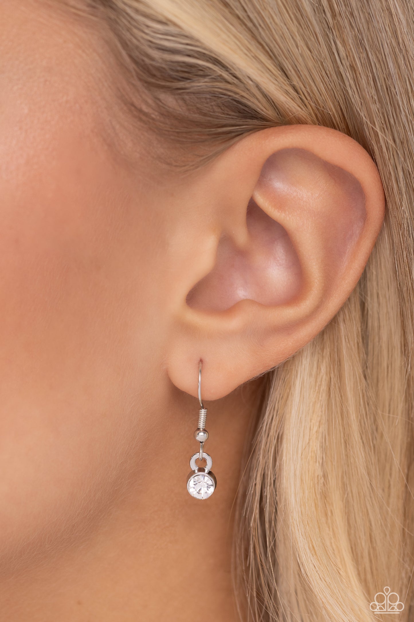 Paparazzi Accessories - Your Number One Follower - White Rhinestones Necklaces dangling from a collection of oversized, curved links connected to a silver link chain, a locket-inspired pendant rests in the shape of a triangle. Embossed in white rhinestones, a #1 gleams from the center of the pendant for a sports-inspired finish. Features an adjustable clasp closure. Sold as one individual necklace. Includes one pair of matching earrings.