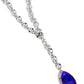 Paparazzi Accessories - Benevolent Bling - Purple Necklaces set in an elevated silver-pronged frame, a faceted purple UV teardrop gem cascades from an oblong, abstract silver ring chain that extends past the collar for a blinding statement. Features an adjustable clasp closure.  Sold as one individual necklace. Includes one pair of matching earrings.
