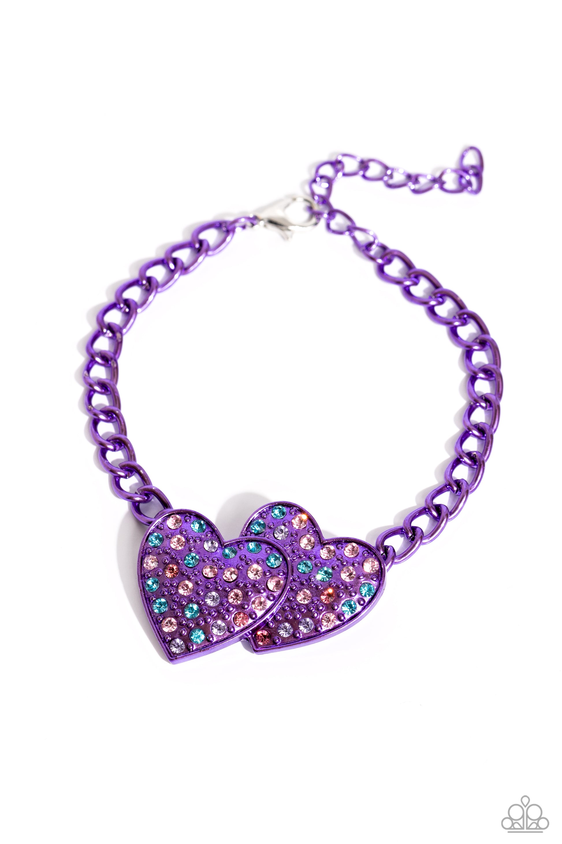 Paparazzi Accessories - Lowkey Lovestruck - Purple Jewelry Sets dipped in an electric purple hue, a strand of bulky chain gives way to three heart frames below the collar. Dotted with tactile electric purple studs, the interlocked heart frames feature various pink, blue, purple, and white rhinestones for a timeless finish. Features an adjustable clasp closure. Sold as one individual necklace. Includes one pair of matching earrings.