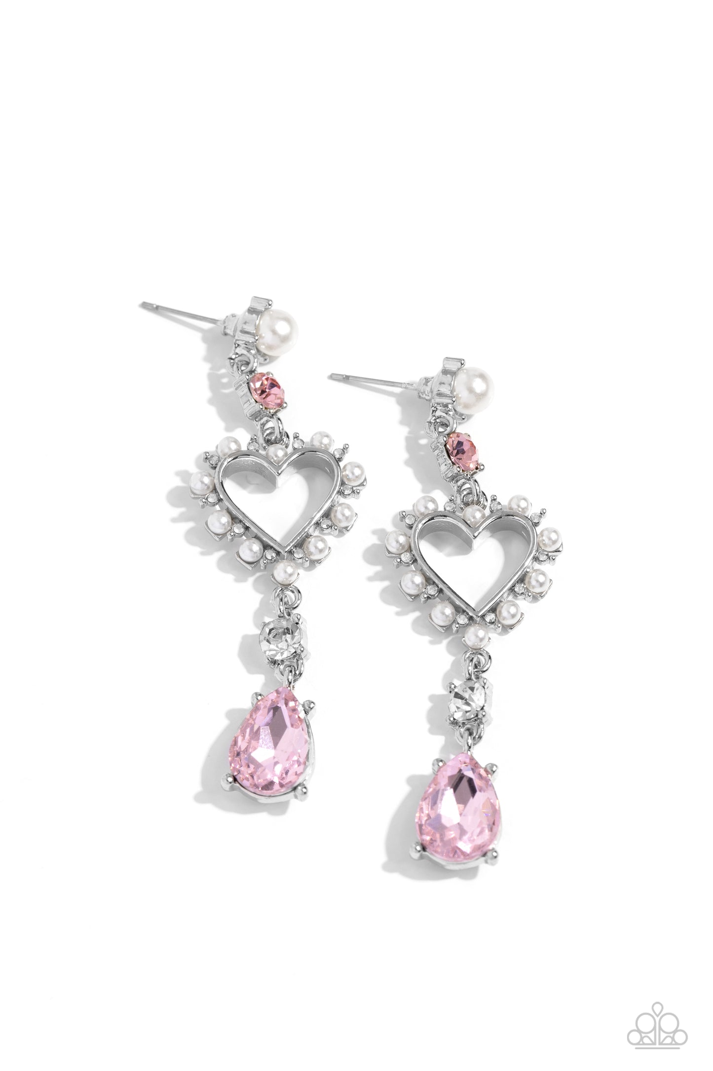 Paparazzi Accessories - Lovers Lure - Pink Heart Earringsaa white pearl and pink gem are pronged in silver fittings as they give way to an airy heart frame embellished with dainty white pearls and iridescent rhinestones for a dreamy finish. A white gem and pink teardrop gem, pressed in the same pronged fittings, dramatically swing from the bottom of the airy heart frame, capturing and reflecting light at every hypnotic sway. Earring attaches to a standard post fitting.