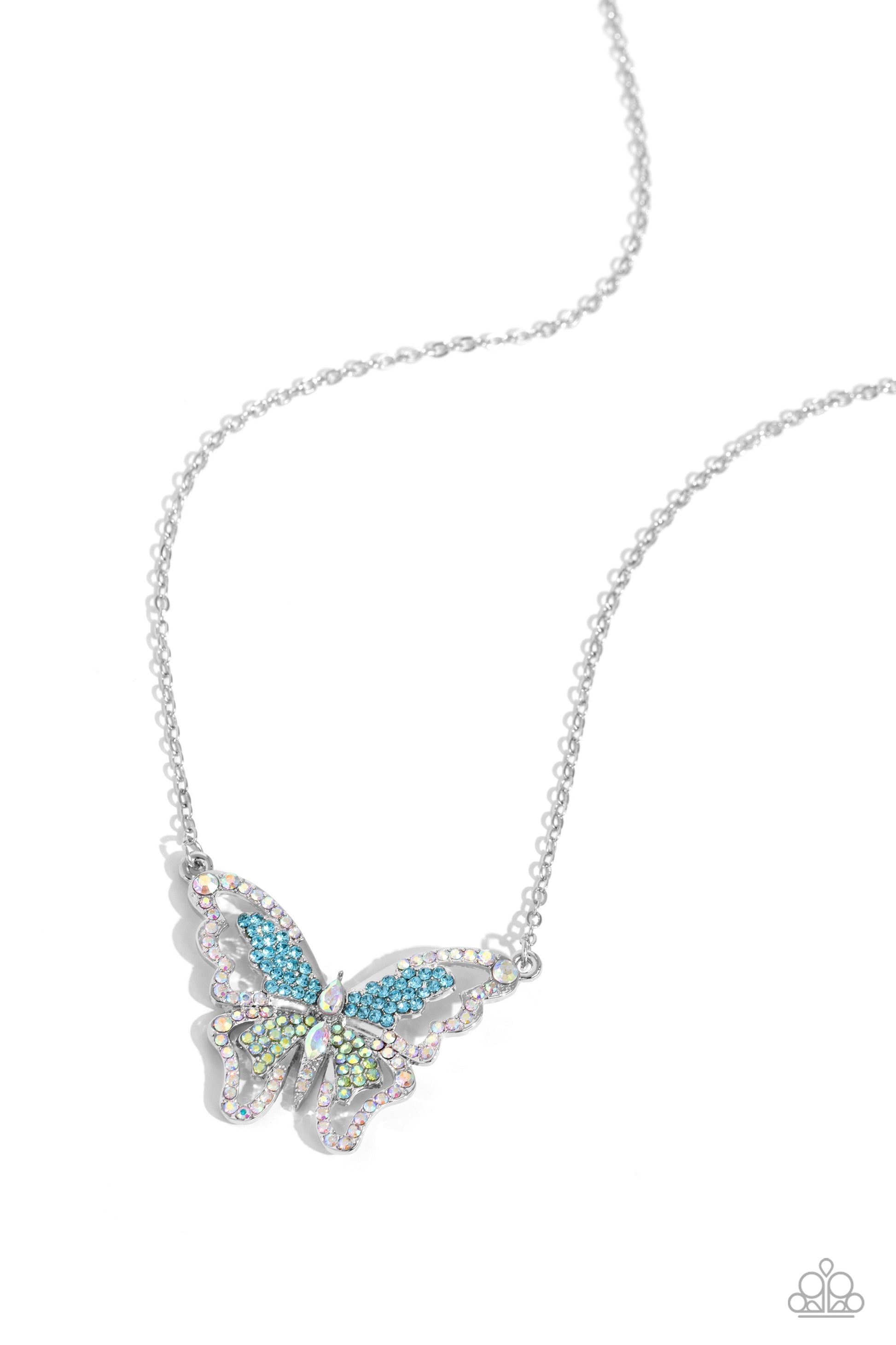 Paparazzi Accessories - Weekend WINGS - Multi Necklaces bordered in glassy iridescent rhinestones, an airy, oversized silver butterfly is dotted in dainty green and blue rhinestones in various cuts as it flutters from a silver chain below the collar for an enchanting fashion. Features an adjustable clasp closure. Due to its prismatic palette, color may vary. Sold as one individual necklace. Includes one pair of matching earrings.