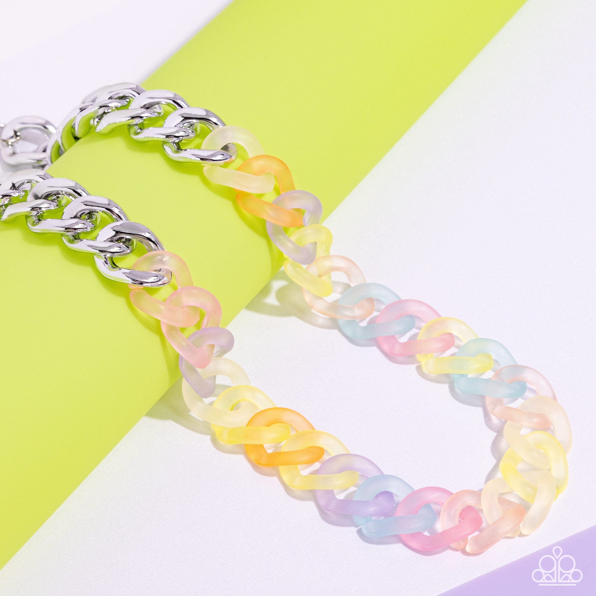 Paparazzi Accessories - Rainbow Ragtime - Multi Necklaces featuring a kaleidoscope of colors, acrylic rings connect to high-sheen silver curb chain links for a magically multicolored display. Features an adjustable clasp closure.  Sold as one individual necklace. Includes one pair of matching earrings.