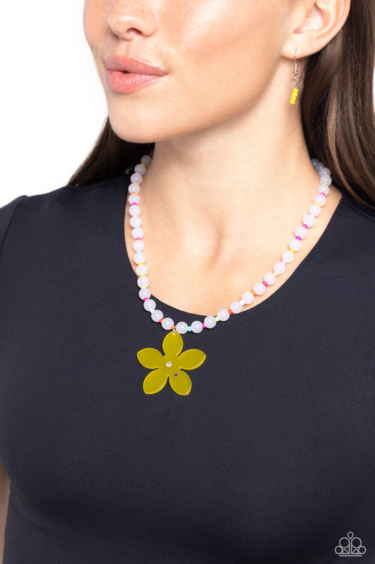 Infused along an invisible string around the neckline, a collection of milky white beads alternates with yellow, Kohlrabi, Pink Peacock, purple, orange, white, and lavender seed beads. Featuring an iridescent rhinestone center and a sapphire rhinestone accent, a yellow acrylic flower dangles from the center of the display for a nostalgic finish. Features an adjustable clasp closure. Due to its prismatic palette, color may vary. Sold as one individual necklace.