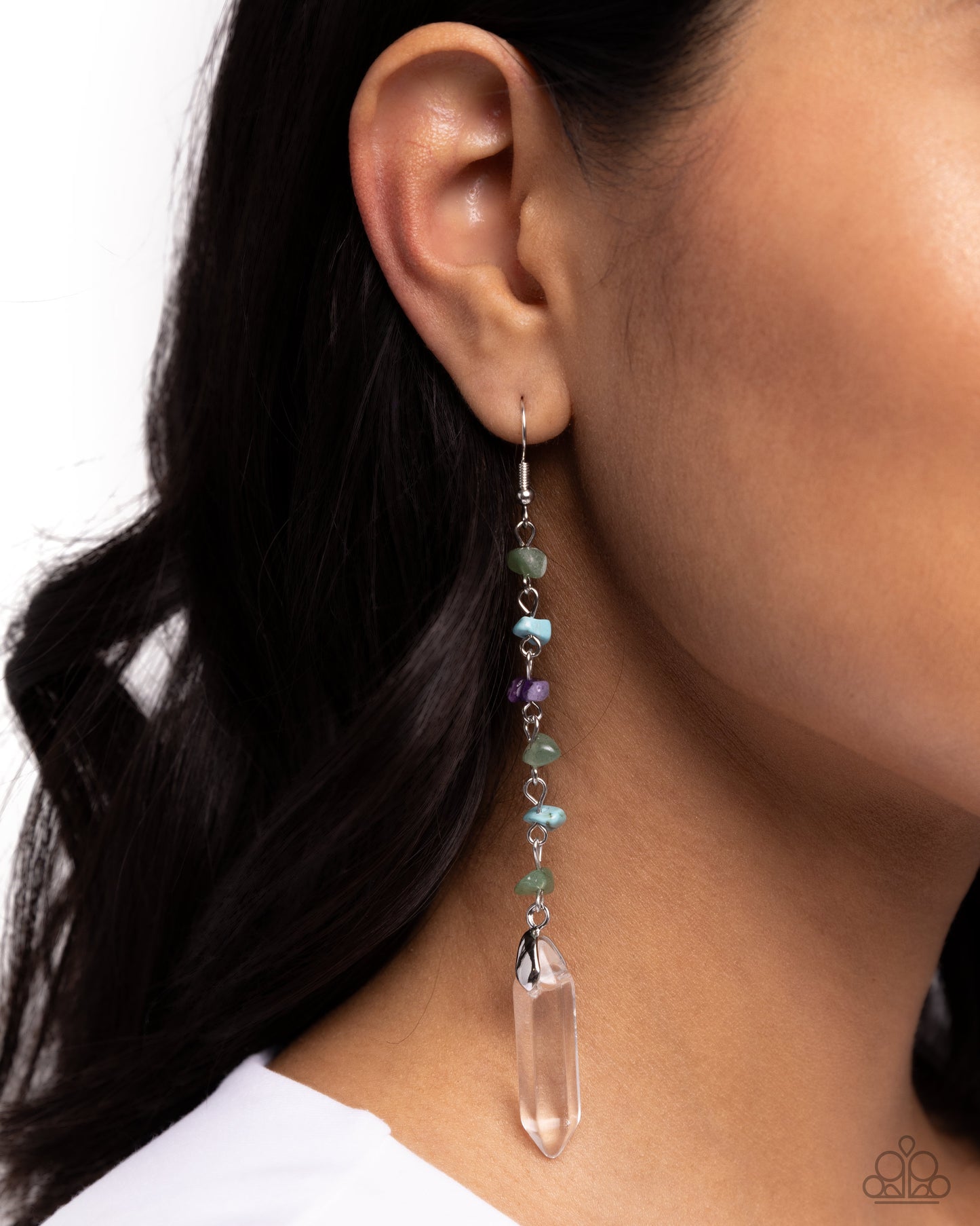 Paparazzi Accessories - Quartz Qualification - Green Earrings chiseled jade, turquoise, and amethyst stones connect down the ear along a silver chain, leading the eye to a clear quartz-like piece at its end for an elegantly earthy lure. Earring attaches to a standard fishhook fitting. As the stone elements in this piece are natural, some color variation is normal. Sold as one pair of earrings.