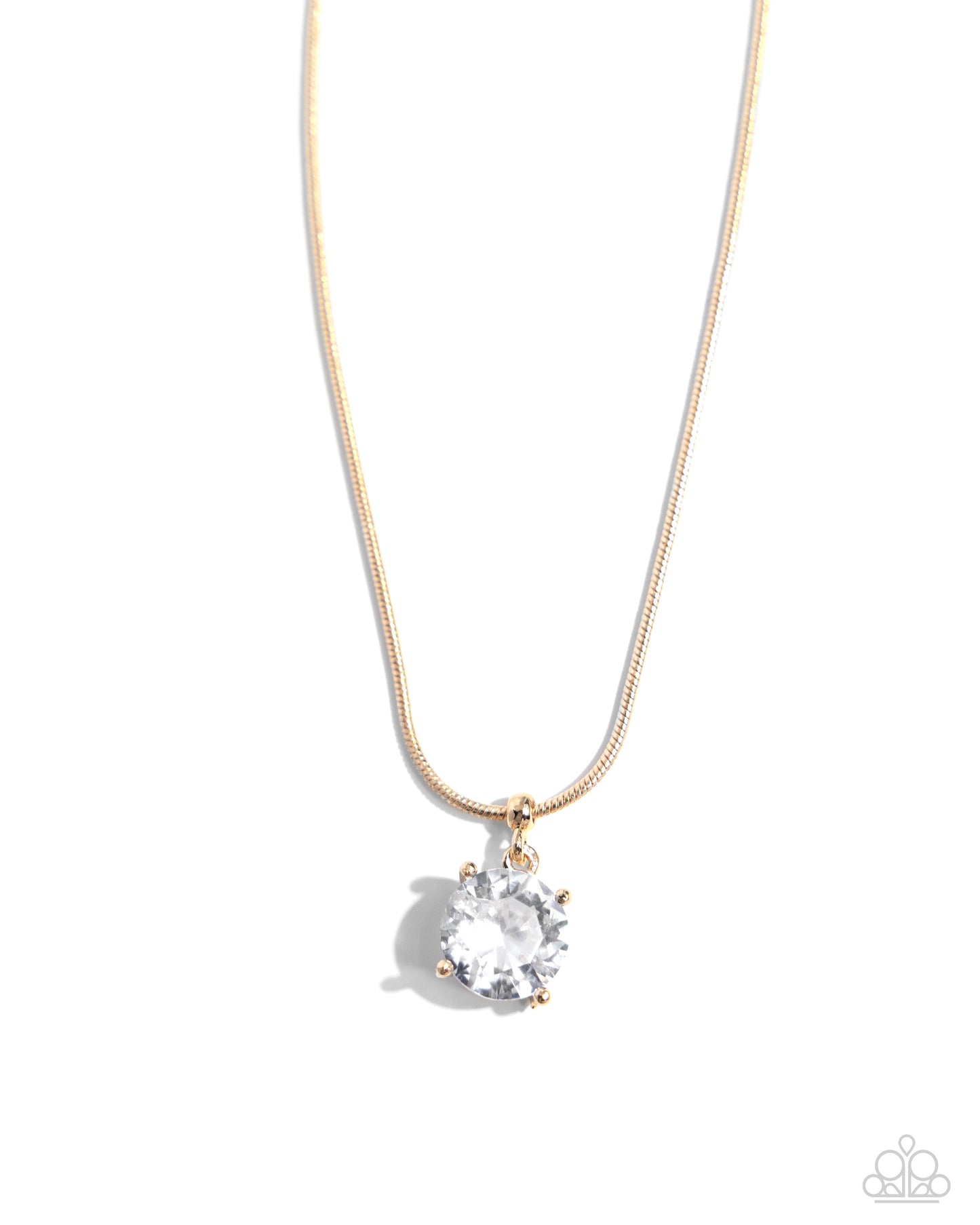 Set in pronged gold fittings, a faceted, glittery white gem glides along a gold snake chain for a beautiful basic. Features an adjustable clasp closure. Sold as one individual necklace. Includes one pair of matching earrings.