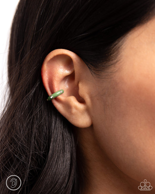 <p>Paparazzi Accessories - Coastal Color - Green Ear Cuffs featuring a green painted surface, a white rhinestone-dotted silver cuff curls around the ear, creating an adjustable, one-size-fits-all colorful cuff.</p> <p><i>Sold as one pair of cuff earrings.</i></p>