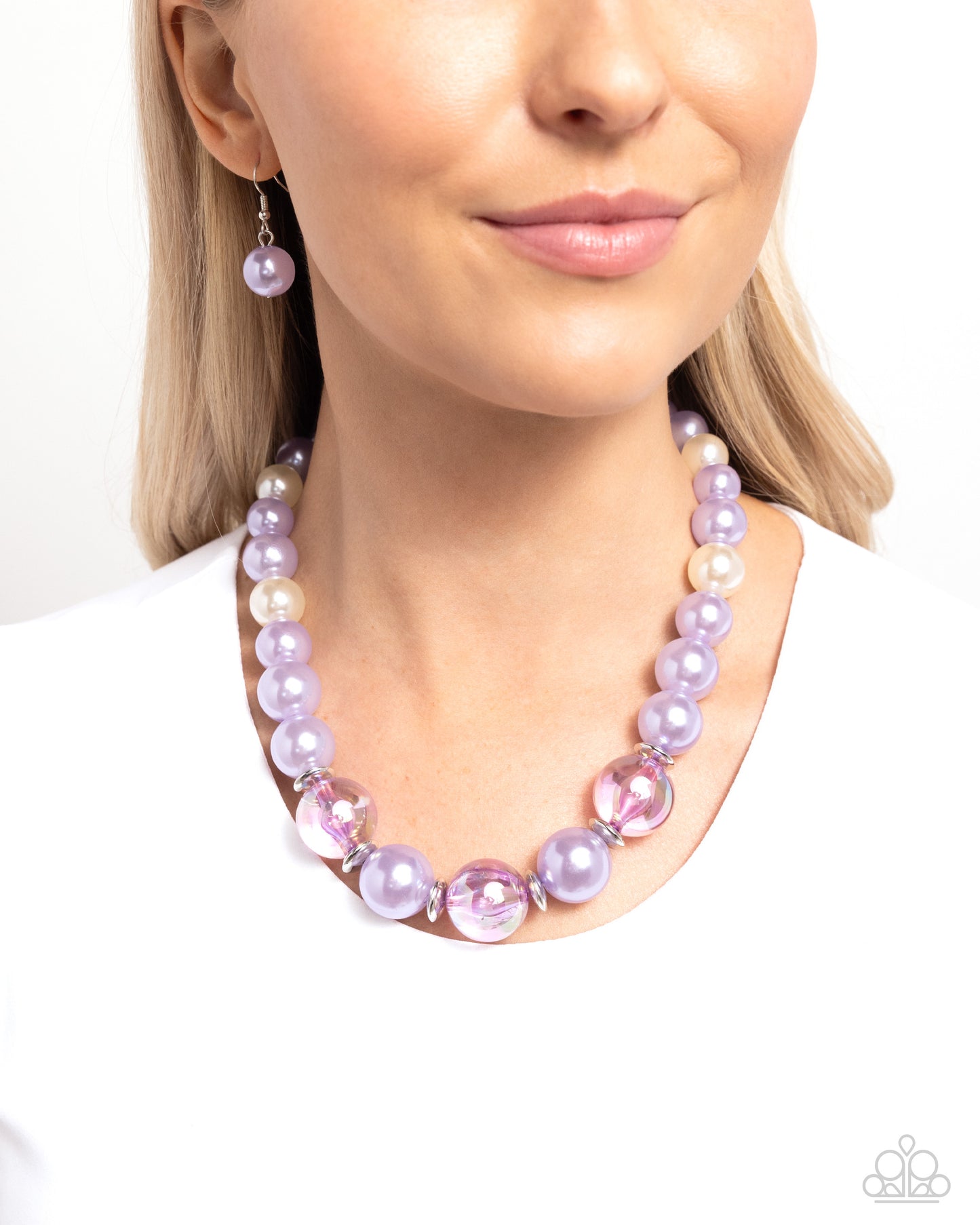 <p data-mce-fragment="1">Strung along an invisible thread, a collection of Pastel Lilac pearls, white pearls, silver discs, and Pastel Lilac iridescent beads of varying sizes loop around the neckline for a radically refined display. Features an adjustable clasp closure. Due to its prismatic palette, color may vary.</p> <p data-mce-fragment="1"><i data-mce-fragment="1">Sold as one individual necklace. Includes one pair of matching earrings.</i></p>