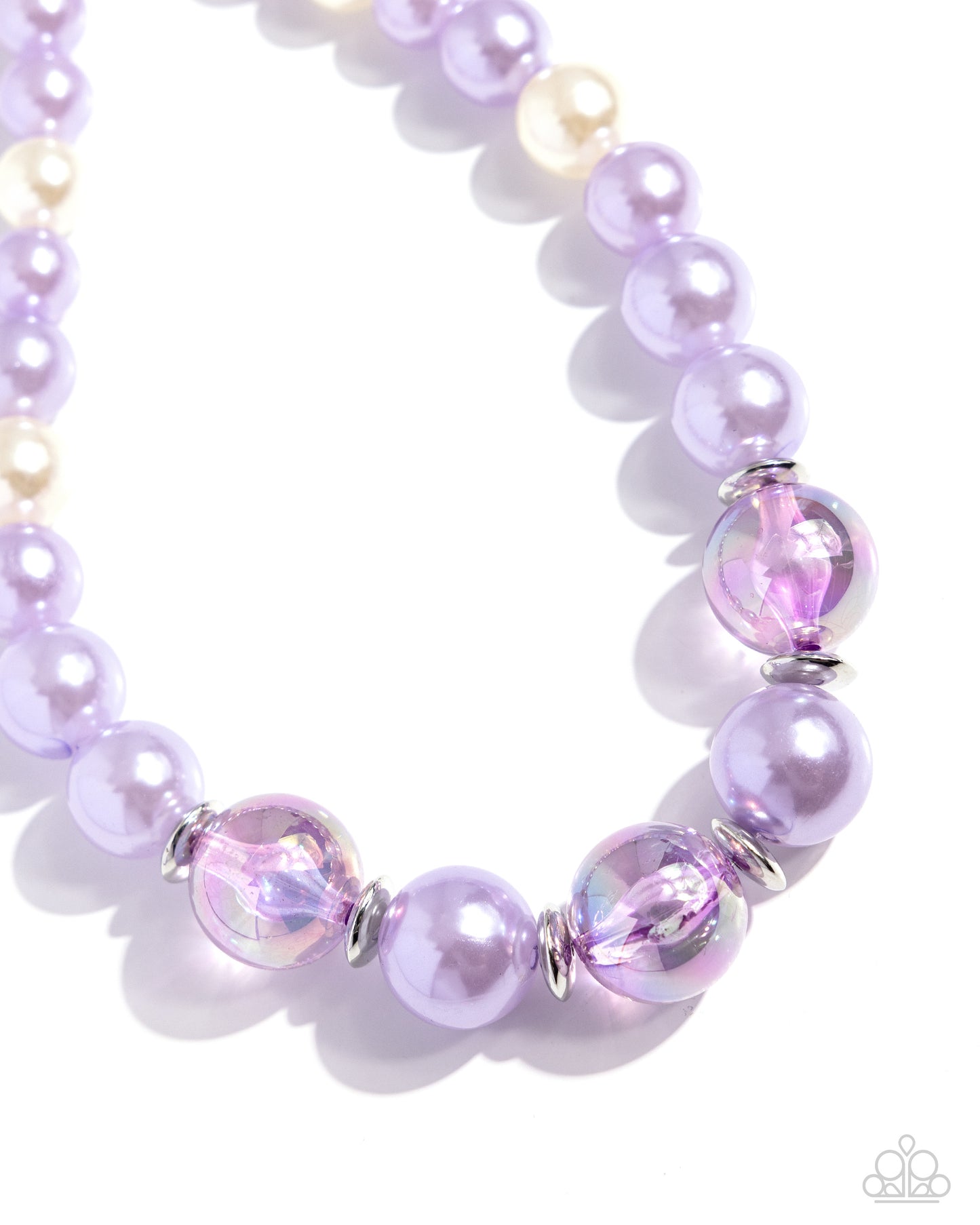 <p data-mce-fragment="1">Strung along an invisible thread, a collection of Pastel Lilac pearls, white pearls, silver discs, and Pastel Lilac iridescent beads of varying sizes loop around the neckline for a radically refined display. Features an adjustable clasp closure. Due to its prismatic palette, color may vary.</p> <p data-mce-fragment="1"><i data-mce-fragment="1">Sold as one individual necklace. Includes one pair of matching earrings.</i></p>