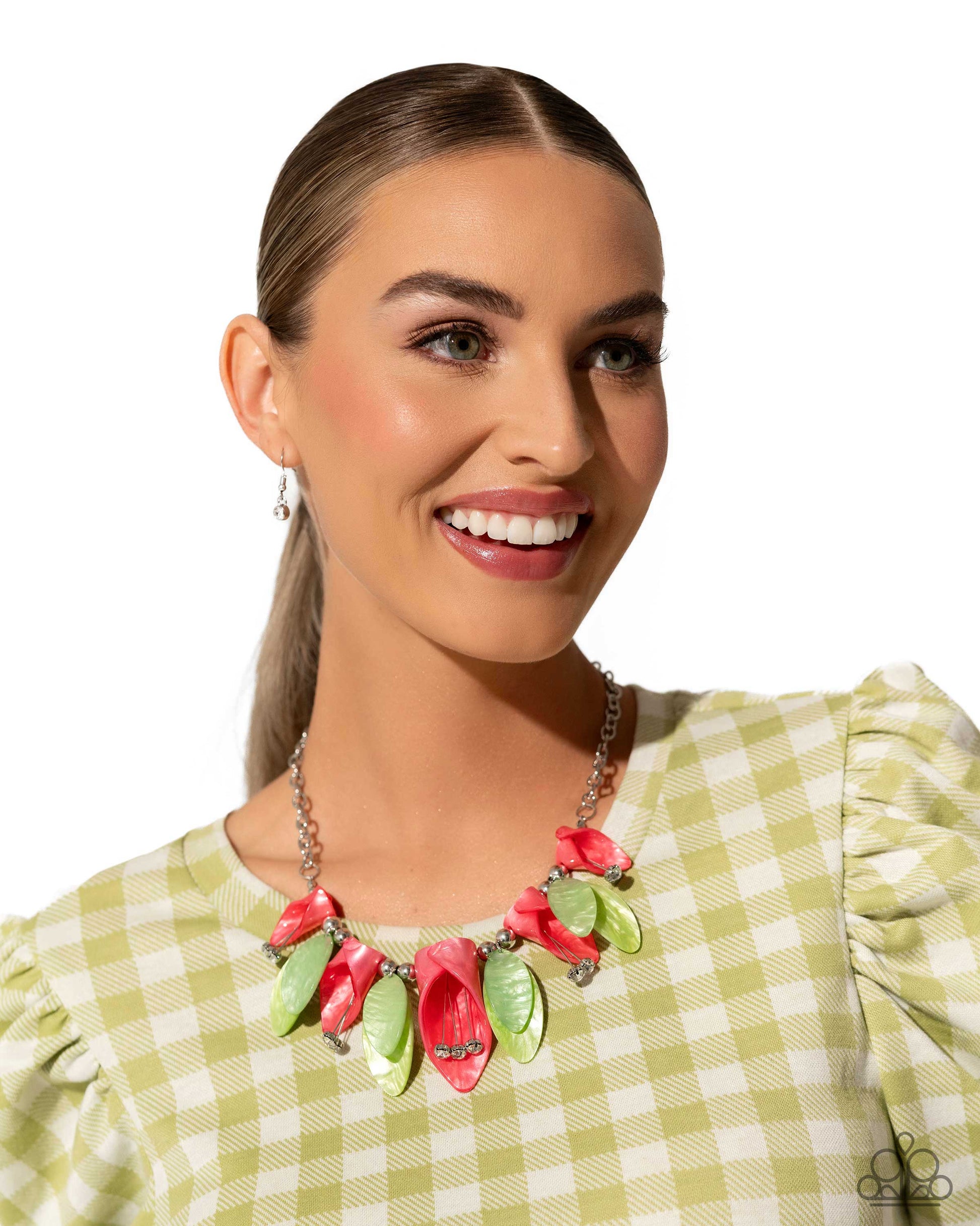 Bright coral acrylics, curl into tulip-like flowers while green acrylics, featuring a reflective shimmer, layer into leaves that alternate with the coral tulips. White gems bloom from dainty silver wires, forming into pistils from the coral tulips while glossy duos of silver beads frame the green leaves for additional sheen. Features an adjustable clasp closure.  Sold as one individual necklace. Includes one pair of matching earrings.