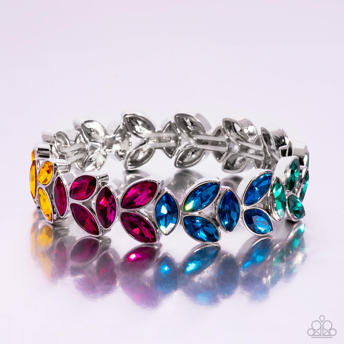 Paparazzi Accessories - Gilded Gardens - Multi Bracelets trios of elegant marquise multicolored rhinestones delicately join into leafy silver frames along a stretchy band, creating a refined display around the wrist. Sold as one individual bracelet.