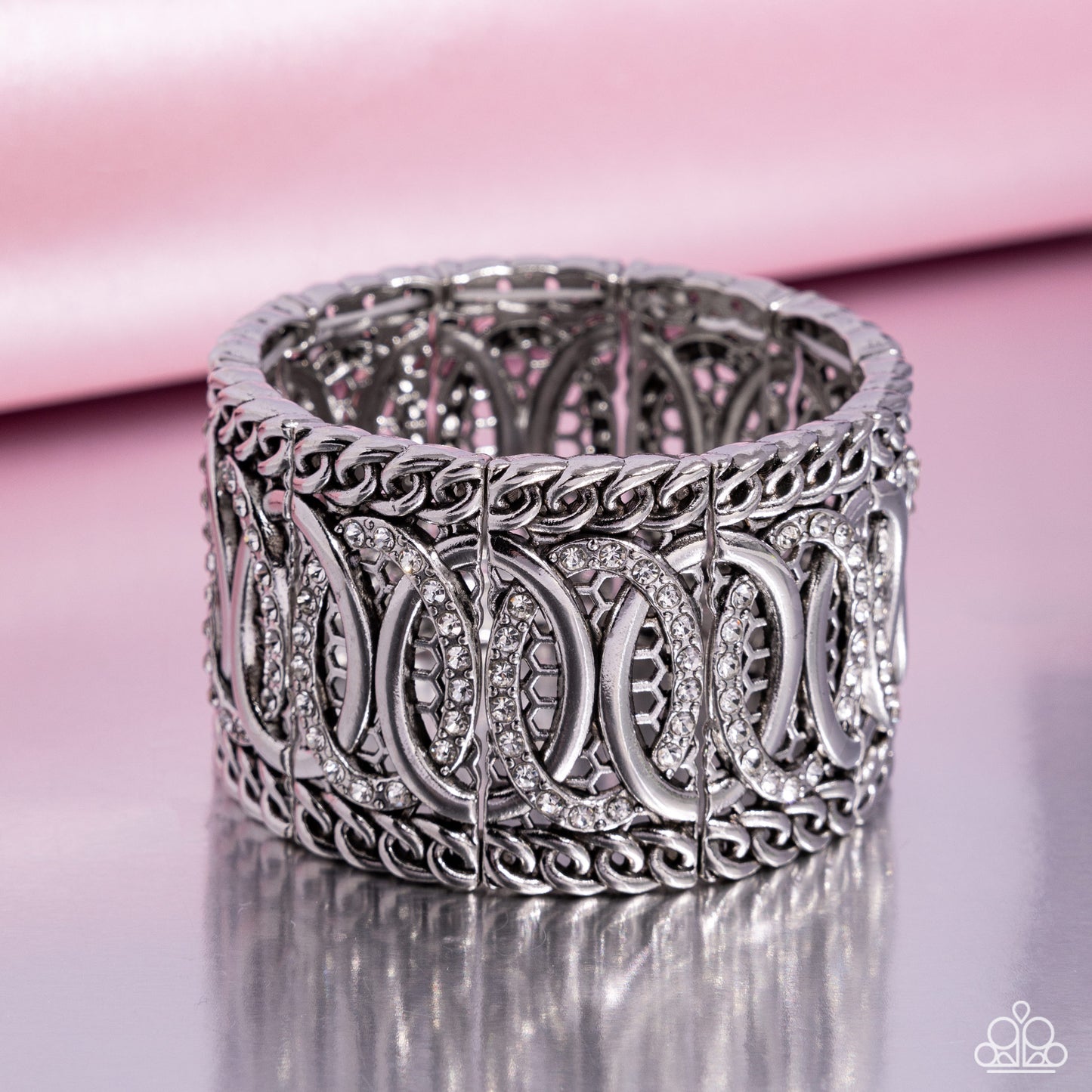Paparazzi Accessories - Forged Fashion - White Bracelets infused along elastic stretchy bands, a collection of silver chain borders along silver rings that alternate with white rhinestone-encrusted rings for a monochromatic look along the wrist. Sold as one individual bracelet.