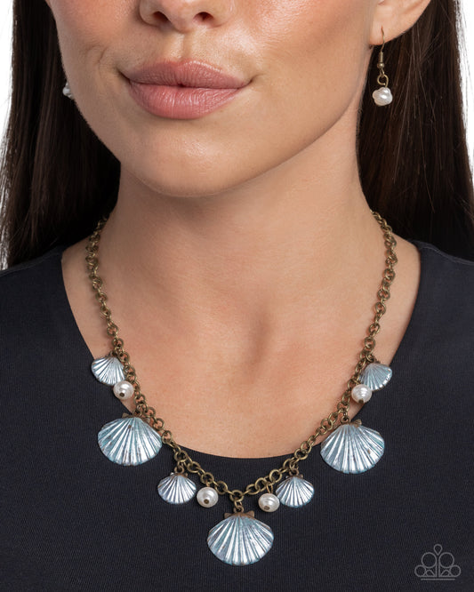 Featuring a mini-beaded floral center, a textured silver flower glides along a gray cord around the neckline creating an adjustable pendant. Highly-embellished silver floral oval beads cap the ends of the gray cording and rise above the solitaire flower for additional whimsy. Features a bolo closure.  Sold as one individual necklace. Includes one pair of matching earrings.