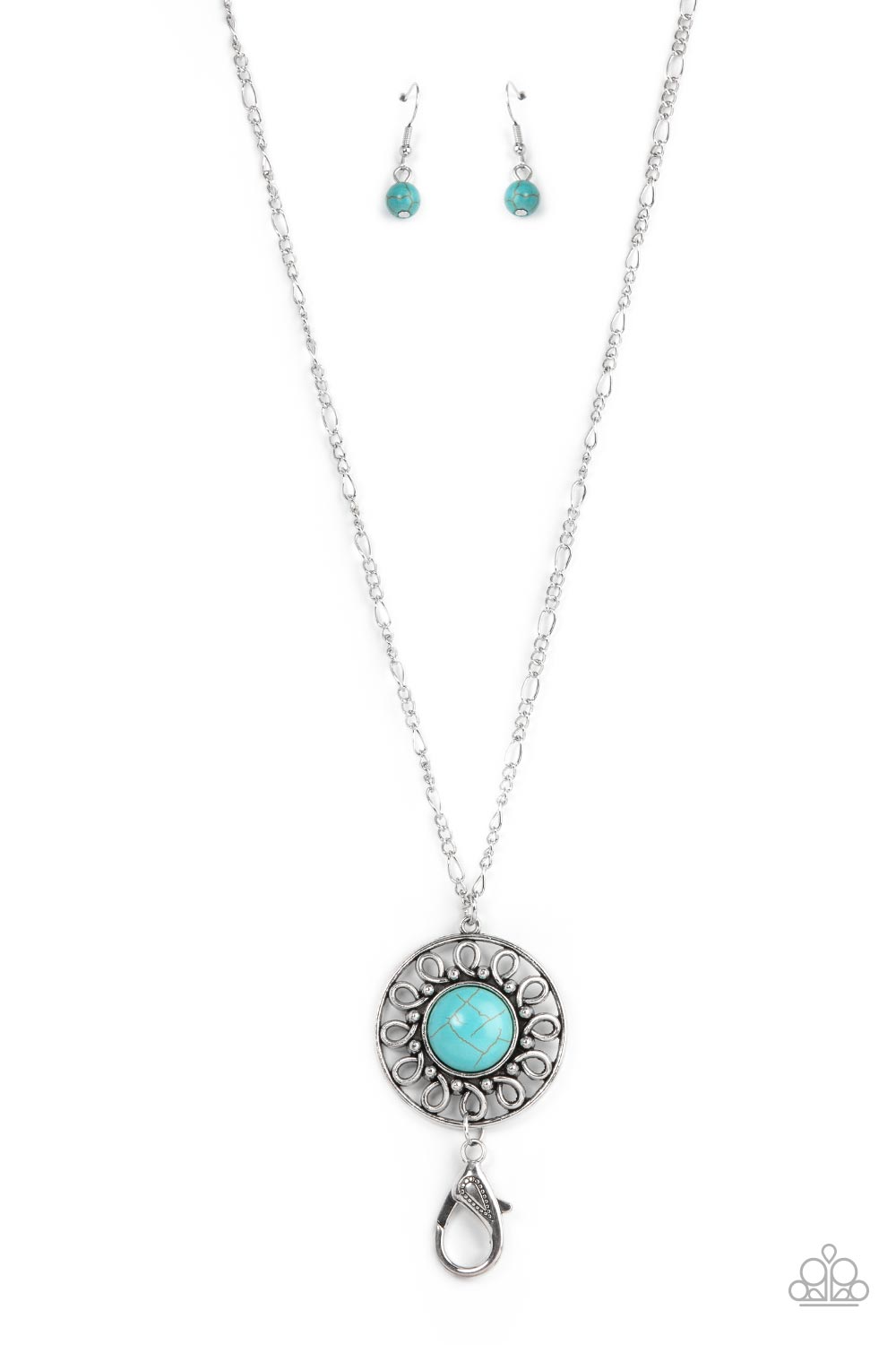 Paparazzi Accessories Sahara Suburb - Blue Lanyard Necklaces an oversized turquoise stone adorns the center of an antiqued silver frame radiating with silver studded and wire-like detail, creating an authentic artisan inspired pendant. A lobster clasp hangs from the bottom of the design to allow a name badge or other item to be attached. Features an adjustable clasp closure.  Sold as one individual lanyard. Includes one pair of matching earrings.