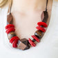 Paparazzi Accessories Pacific Paradise - Red Wood Necklaces featuring abstract geometric finishes, mismatched brown wooden beads and fiery red accents are threaded along shiny brown cording. A dramatic geometric bead adorns the center, creating a bold summery look below the collar. Features a button loop closure.  Sold as one individual necklace. Includes one pair of matching earrings.