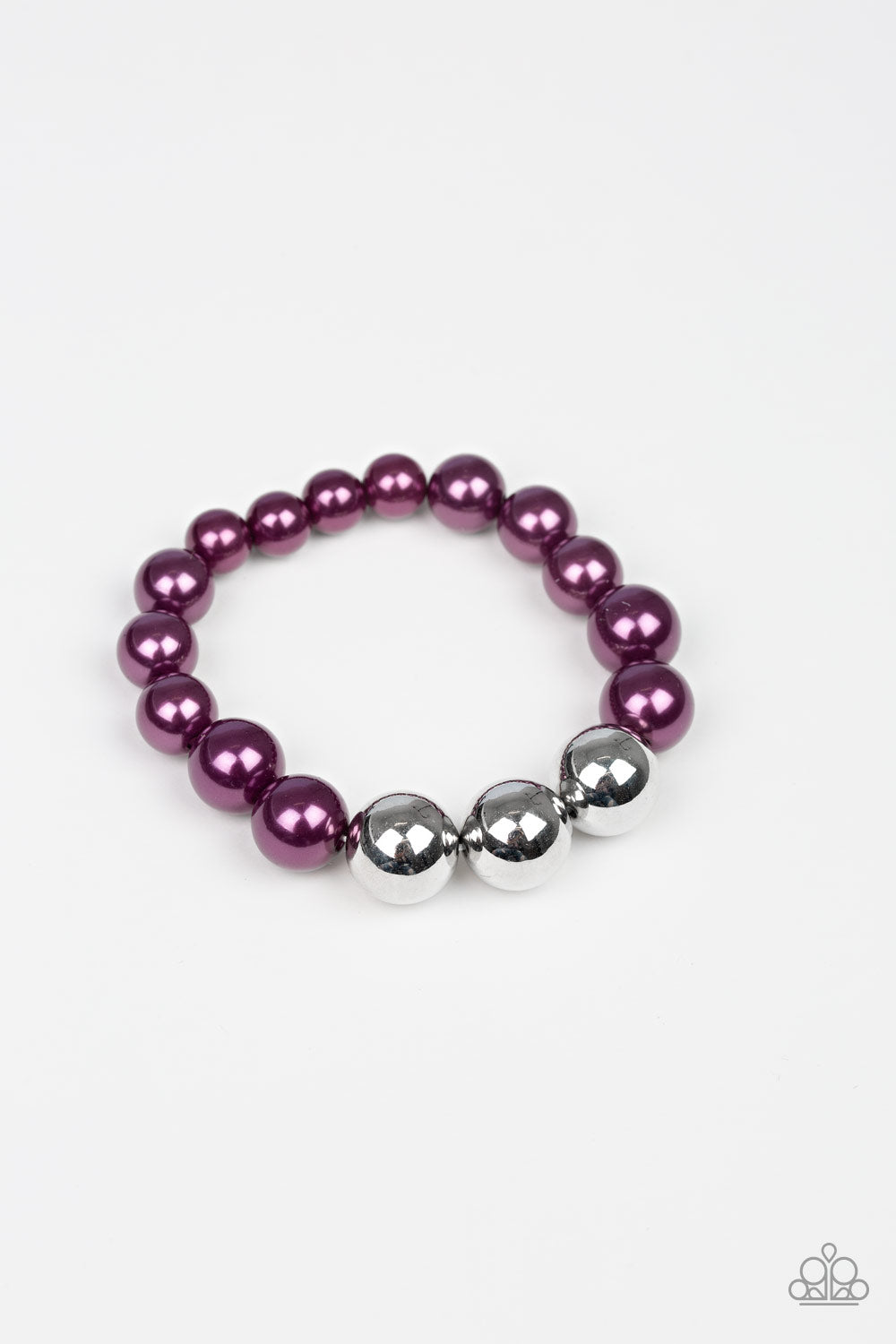 Paparazzi Accessories All Dressed UPTOWN - Purple Bracelets gradually increased in size near the center, oversized pearly purple and shiny silver beads are threaded along a stretchy band around the wrist for a glamorous finish.