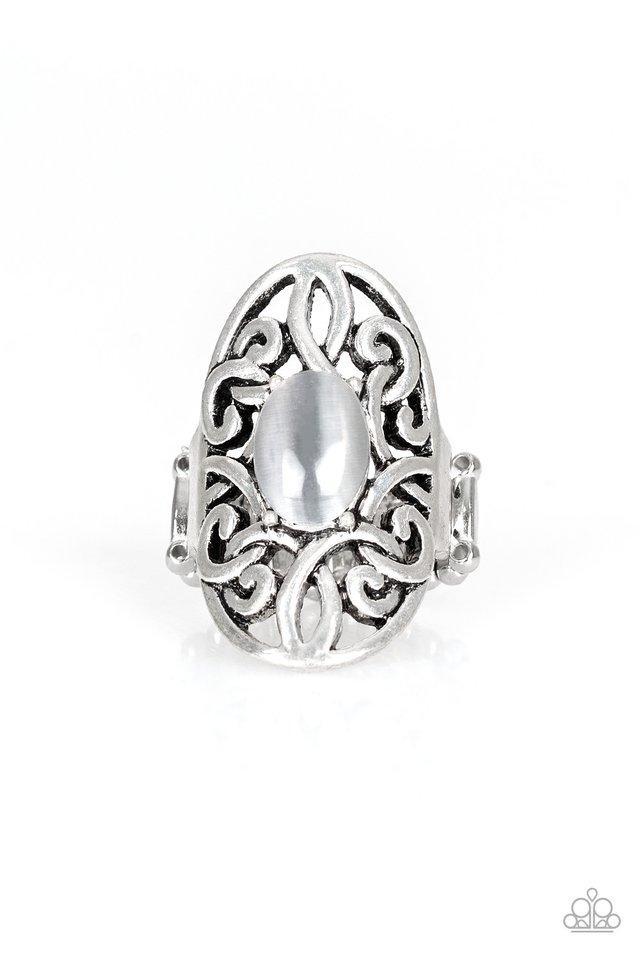Paparazzi Accessories GLEAM Big - Silver Rings a glowing cat's eye stone is pressed into the center of an oval backdrop swirling with vine-like filigree for a whimsical look. Features a stretchy band for a flexible fit.