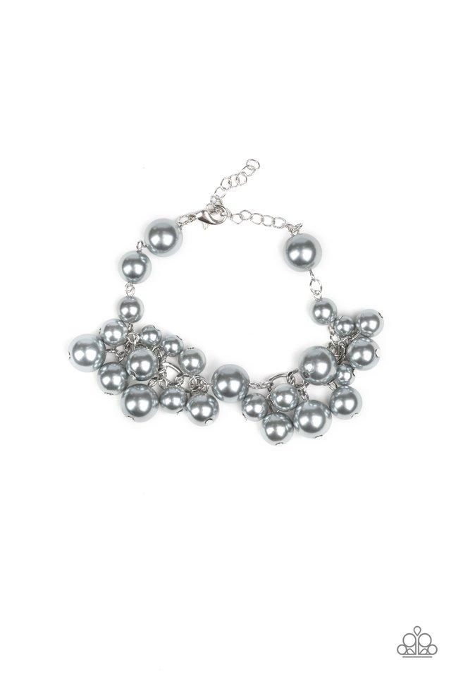 Clusters of classic and oversized silver pearls swing from a pearl beaded silver chain, creating a fabulous fringe. Features an adjustable clasp closure. Sold as one individual bracelet. Paparazzi Jewelry is lead and nickel free so it's perfect for sensitive skin too!