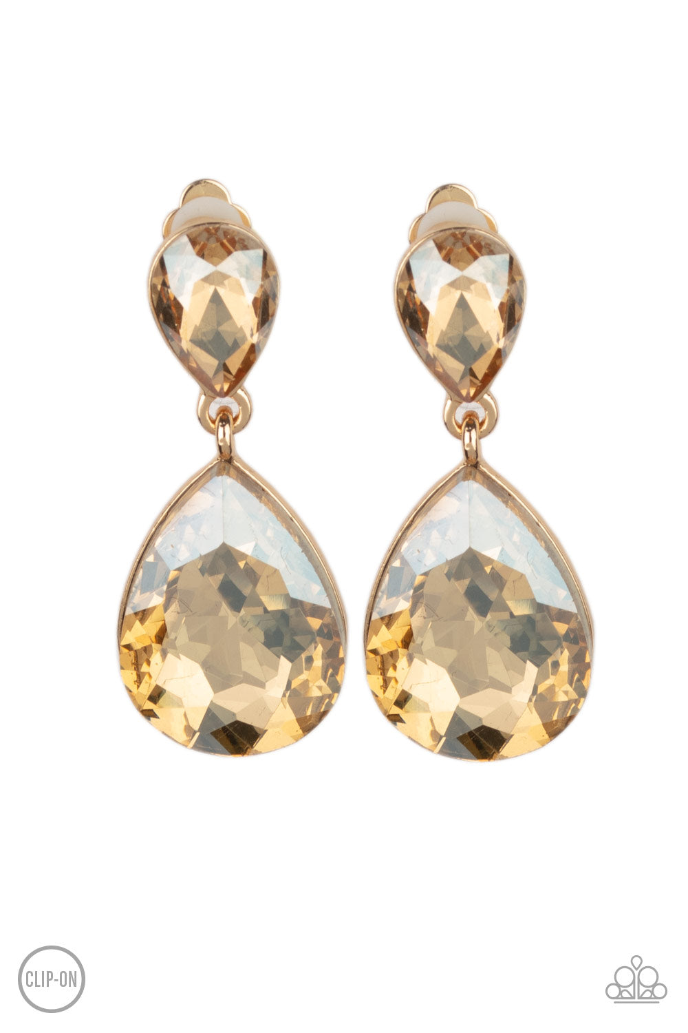 Paparazzi Accessories Aim For the MEGASTARS - Gold Clip-On Earrings dramatically oversized golden rhinestone teardrop swings from the bottom of a smaller rhinestone teardrop, linking into a glamorous lure. Earring attaches to a standard clip-on fitting. Sold as one pair of clip-on earrings.