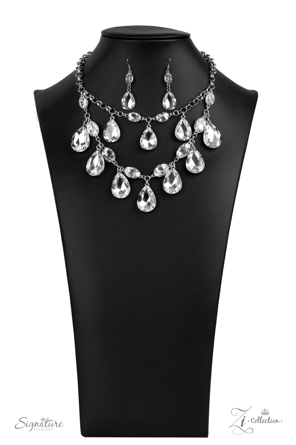 Paparazzi Accessories The Sarah - Zi Collection Necklaces tiers of oversized white teardrop gems demand attention as they drip from two blinding rows of elegantly linked white oval rhinestones. Infused with sections of chunky silver chain links, the sparkling rows brilliantly layer below the collar, becoming the center of every conversation. Features an adjustable clasp closure.