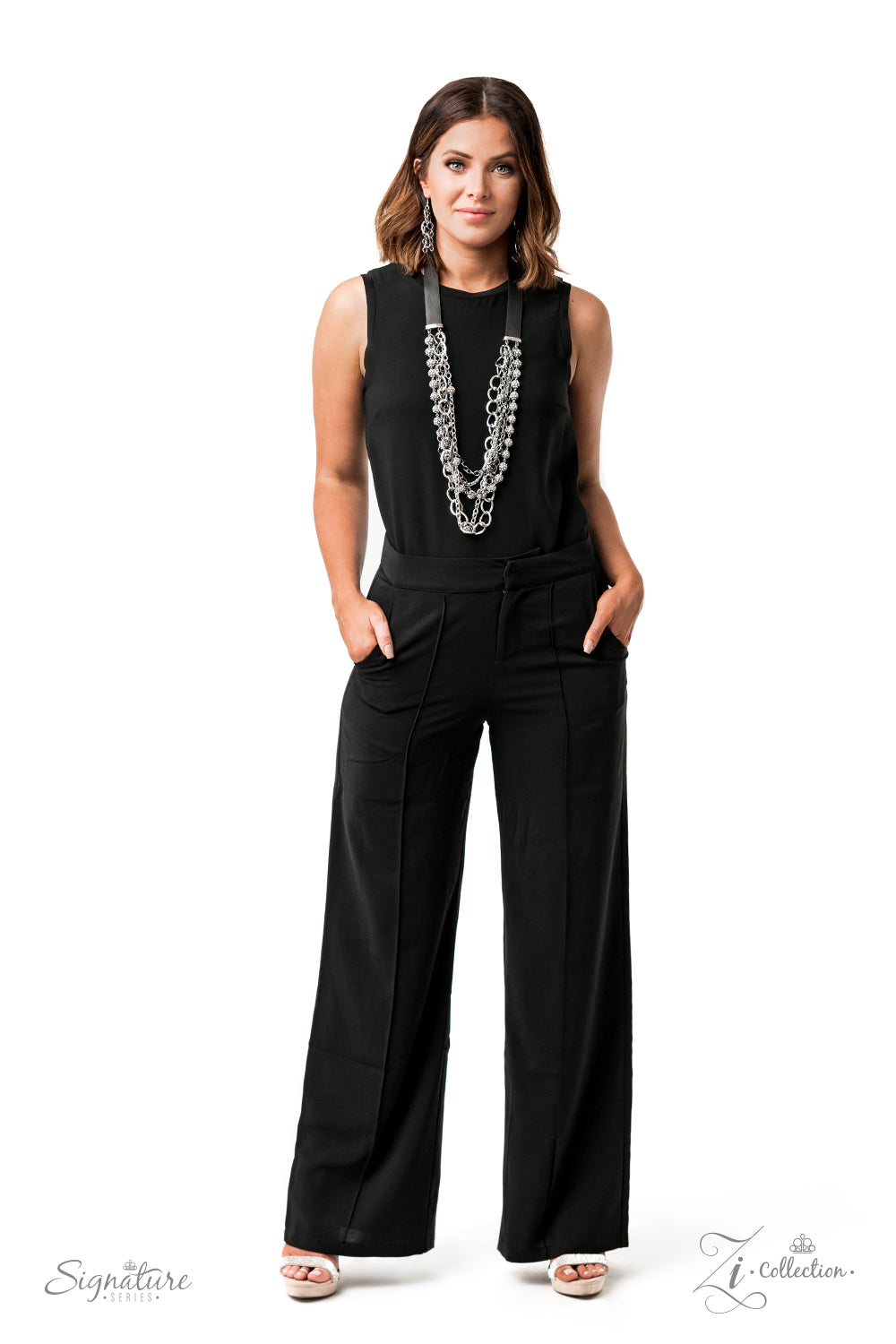 The Arlingto 2020 Zi Collection Necklaces attached to two strips of black leather, strands of bedazzled white rhinestone encrusted silver beads drape between an exaggerated display of mismatched silver and gunmetal chains down the chest. With its edgy sparkle, grunge meets glamour in this heart-stopping statement-maker. Features an adjustable clasp closure. Sold as one individual necklace. Includes one pair of matching earrings.