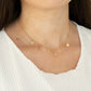 Paparazzi Accessories Love Conquers All - Gold Choker Necklaces nestled between a pair of dainty gold hearts, dangling gold letter charms spell out the word, "LOVE," creating a flirty fringe around the neck. Features an adjustable clasp closure.

Sold as one individual choker necklace. Includes one pair of matching earrings.

