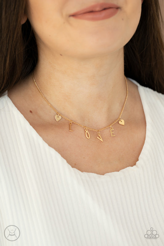 Paparazzi Accessories Love Conquers All - Gold Choker Necklaces nestled between a pair of dainty gold hearts, dangling gold letter charms spell out the word, "LOVE," creating a flirty fringe around the neck. Features an adjustable clasp closure.

Sold as one individual choker necklace. Includes one pair of matching earrings.

