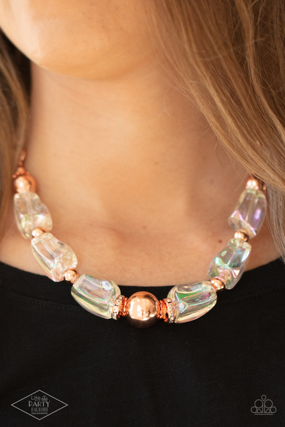 Iridescently Ice Queen - Copper Iridescent Necklaces featuring an icy iridescence, glassy asymmetrical beads join a mismatched collection of shiny copper beads, white rhinestone encrusted rings, and scalloped shiny copper accents below the collar. Attached to a shiny copper chain, the glacial display catches and reflects light for a statement-making finish. Features an adjustable clasp closure. Sold as one individual necklace. Includes one pair of matching earrings.