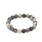 Zen Commandments - Black Urban Bracelets infused with textured silver accents, an earthy collection of swirling black and white stones are threaded along a stretchy band around the wrist for a seasonal fashion.  Sold as one individual bracelet.  Paparazzi Jewelry is lead and nickel free so it's perfect for sensitive skin too!